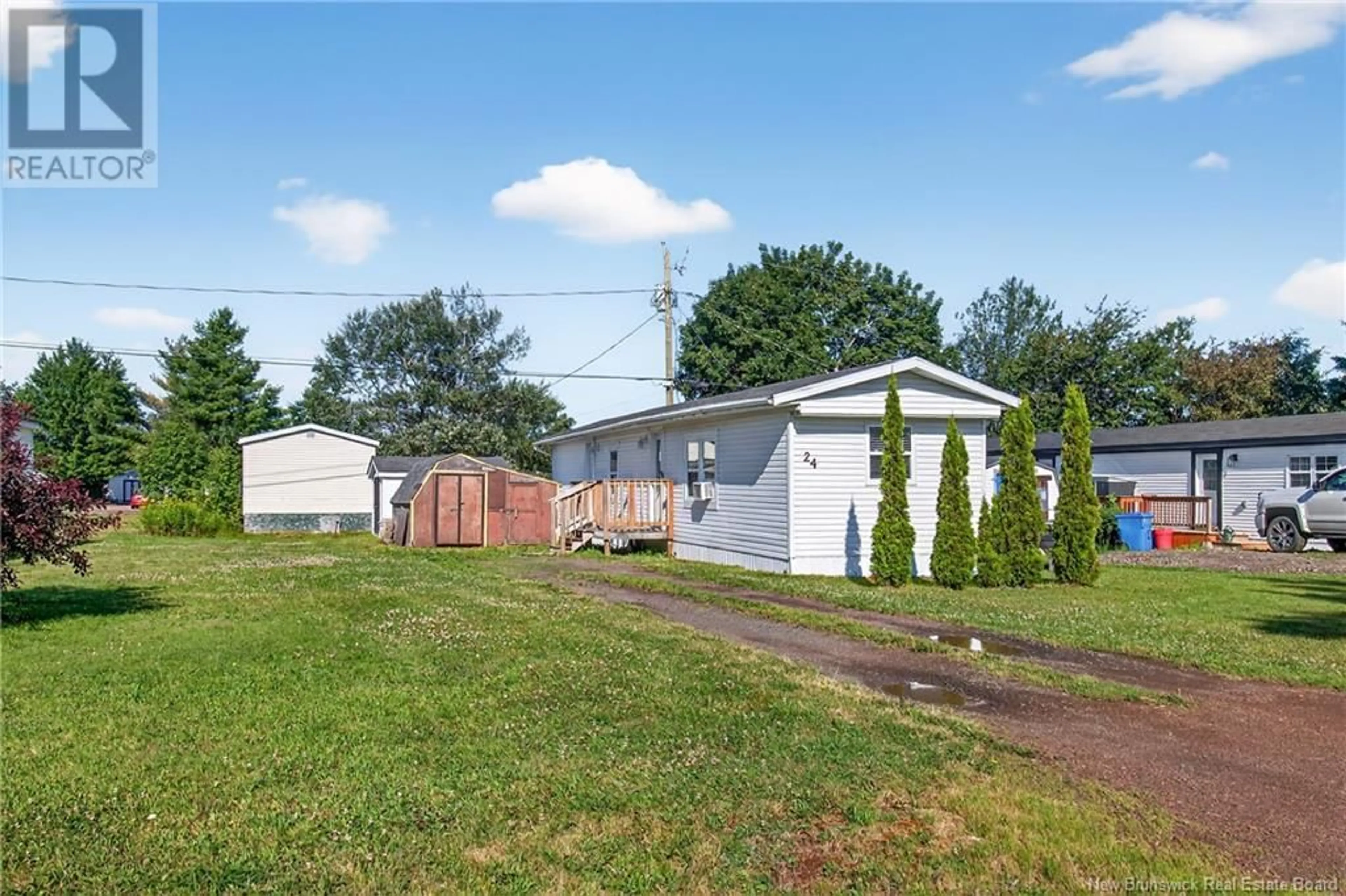A pic from outside/outdoor area/front of a property/back of a property/a pic from drone, street for 24 DUPUIS AVENUE, Lakeville New Brunswick E1H1E2