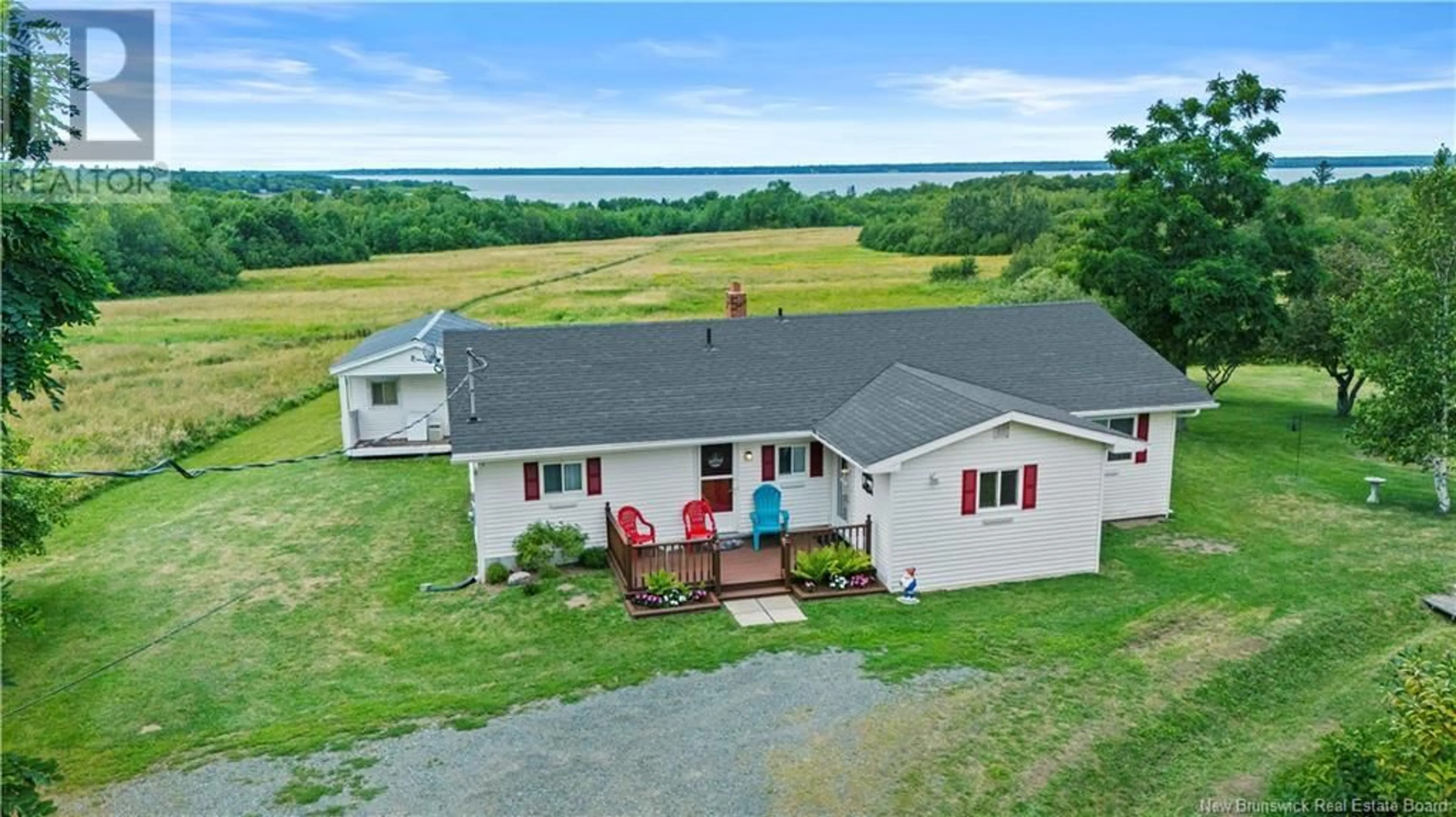 A pic from outside/outdoor area/front of a property/back of a property/a pic from drone, water/lake/river/ocean view for 5271 ROUTE 105, Whites Cove New Brunswick E4C3H1