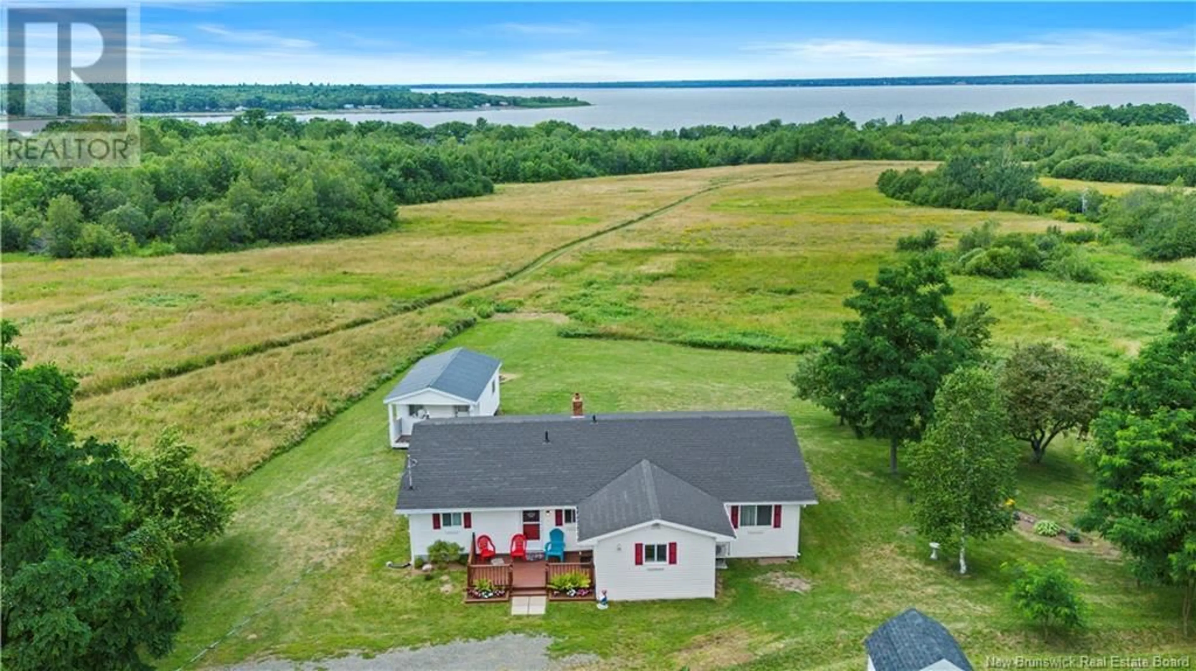 A pic from outside/outdoor area/front of a property/back of a property/a pic from drone, water/lake/river/ocean view for 5271 ROUTE 105, Whites Cove New Brunswick E4C3H1