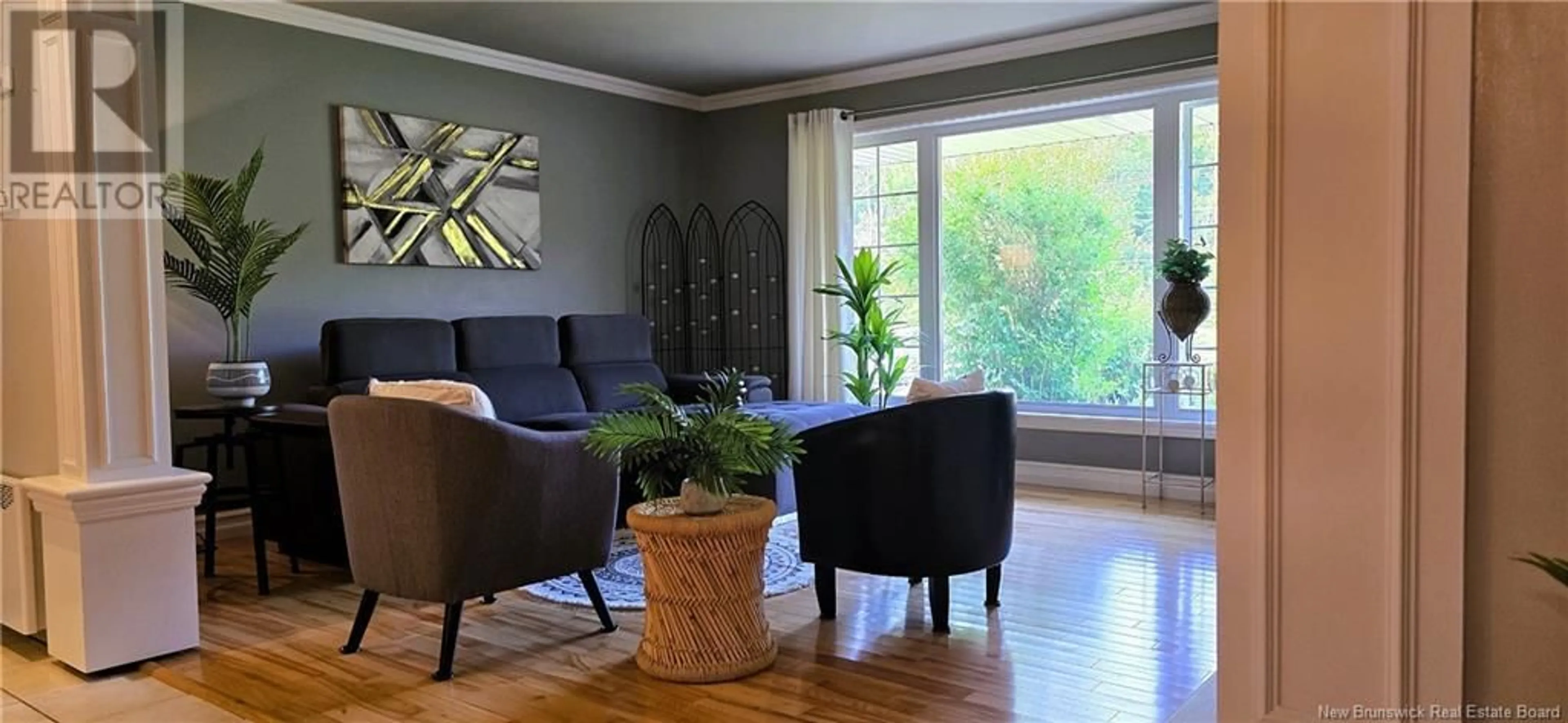 Living room with furniture, wood/laminate floor for 749 RUE ACADIE, Grande-Anse New Brunswick E8N1G3