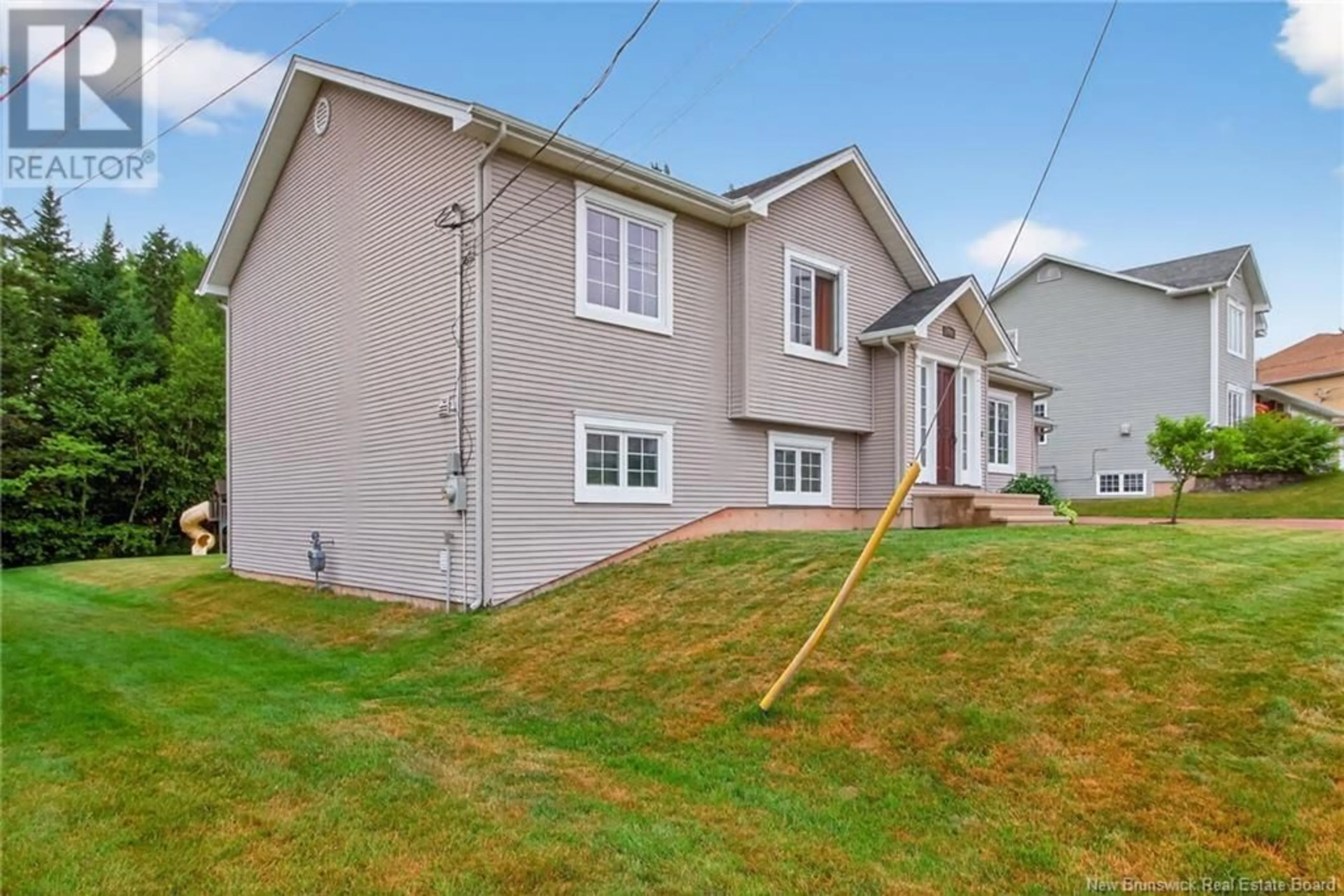 Home with vinyl exterior material, street for 108 MEUNIER STREET, Dieppe New Brunswick E1A7W9