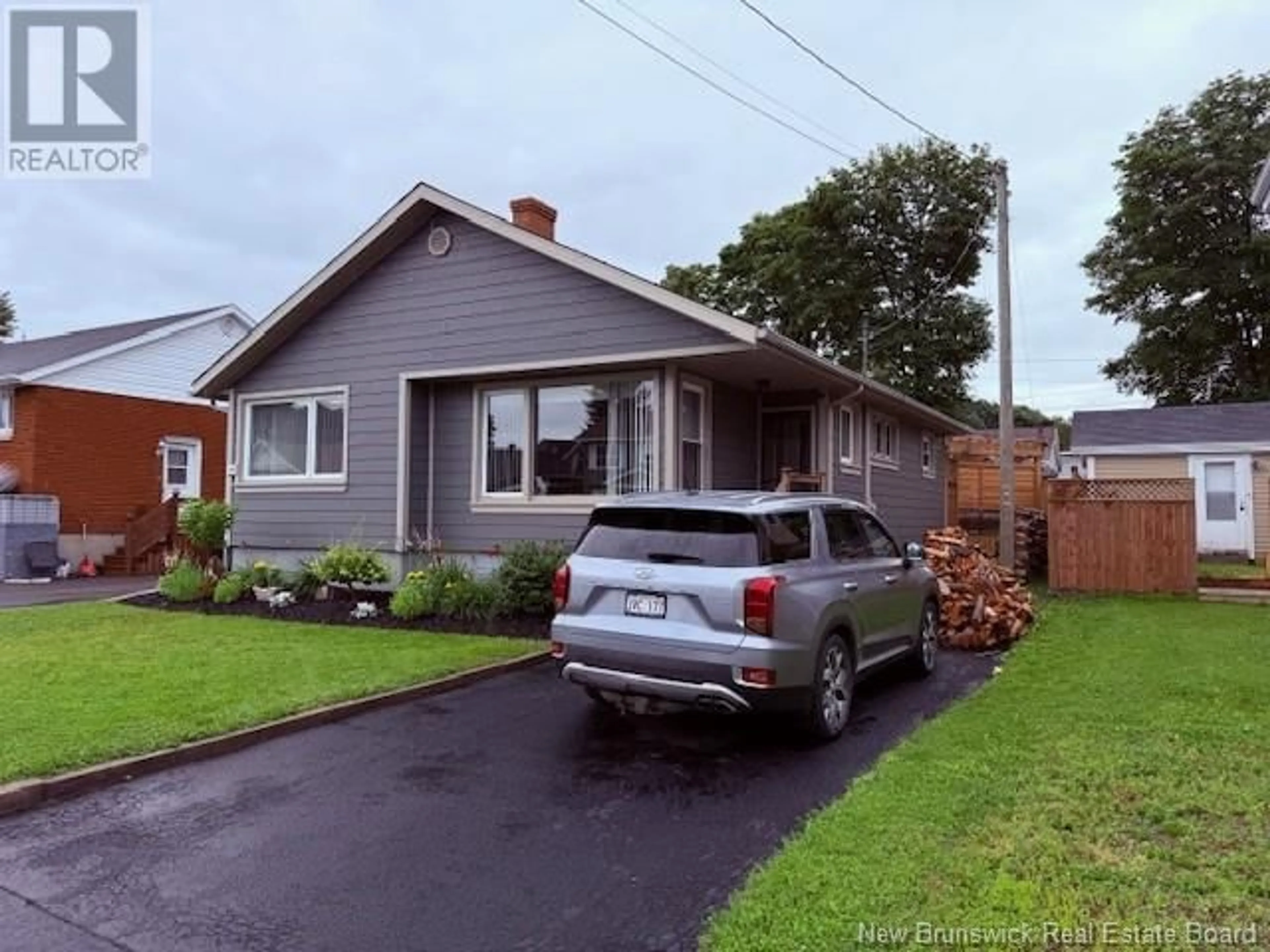 A pic from outside/outdoor area/front of a property/back of a property/a pic from drone, street for 48 VICTORIA STREET, Campbellton New Brunswick E3N1H9