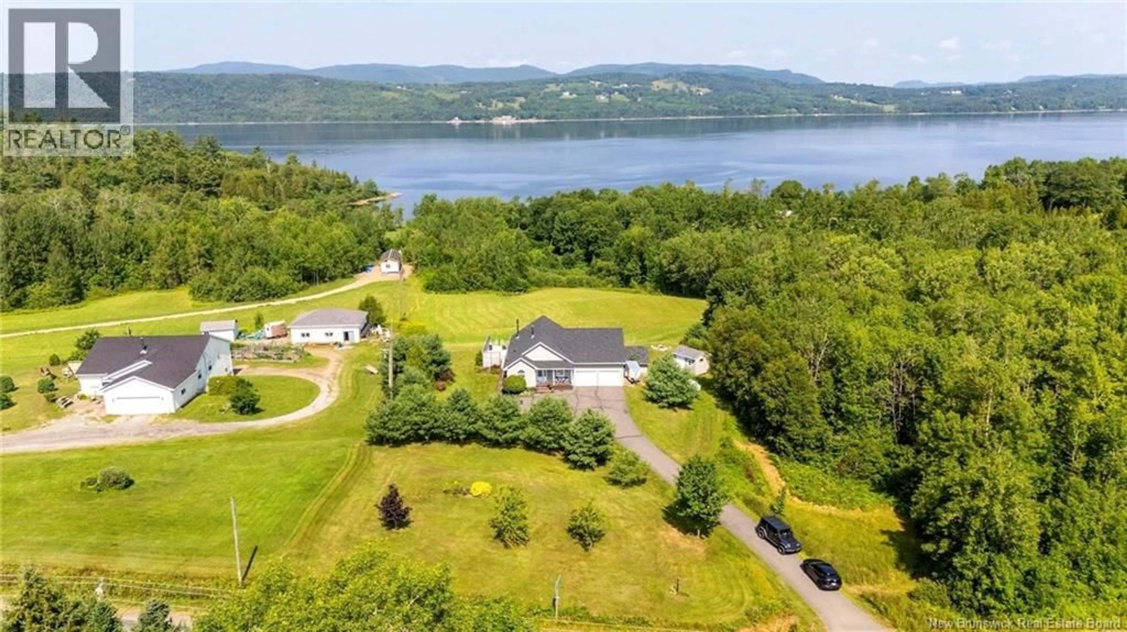 A pic from outside/outdoor area/front of a property/back of a property/a pic from drone, water/lake/river/ocean view for 3115 ROUTE 845, Long Reach New Brunswick E5S2L2