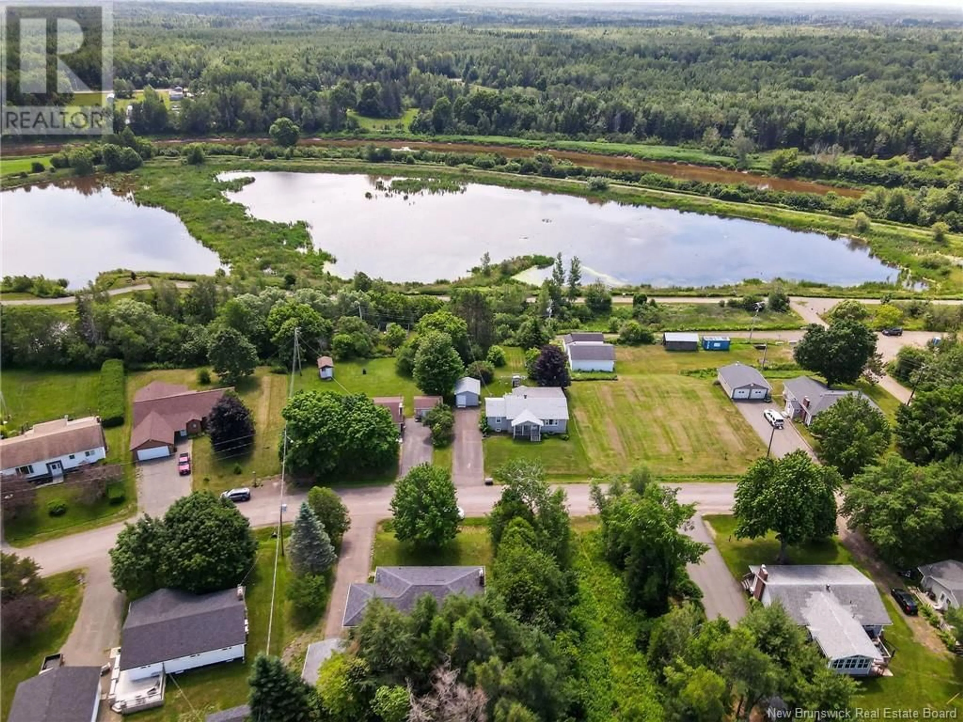 A pic from outside/outdoor area/front of a property/back of a property/a pic from drone, water/lake/river/ocean view for 36 BRAEMAR STREET, Salisbury New Brunswick E4J2A2