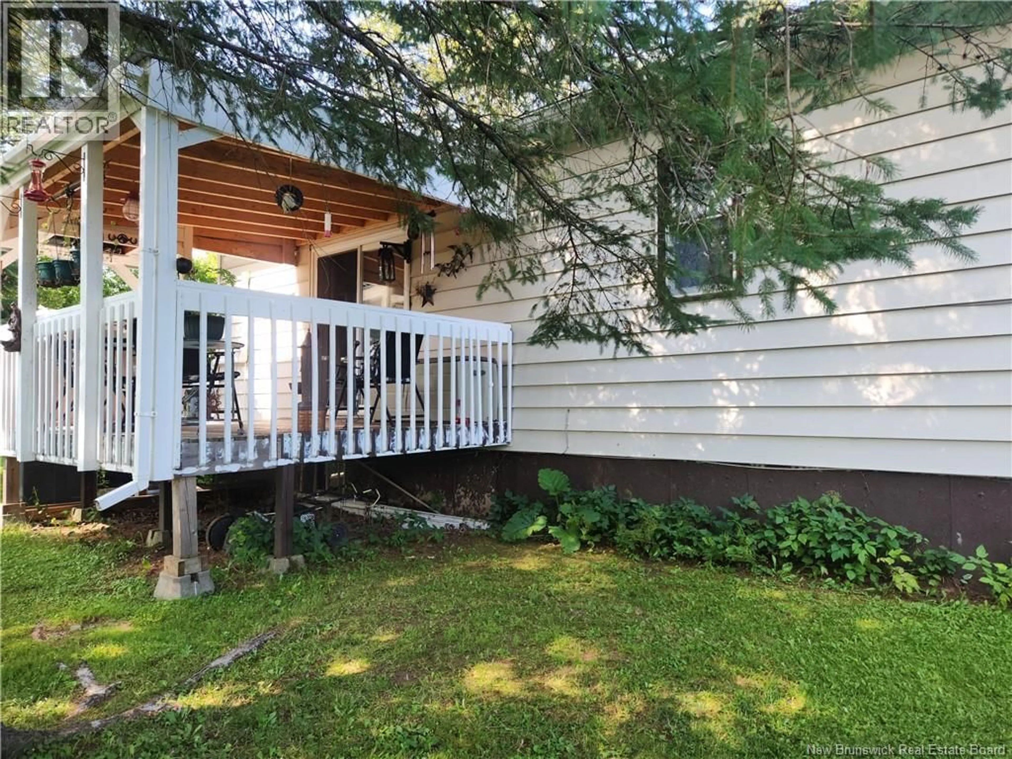 Home with vinyl exterior material, street for 5 SUTTHERY DRIVE, Plaster Rock New Brunswick E7G4B7