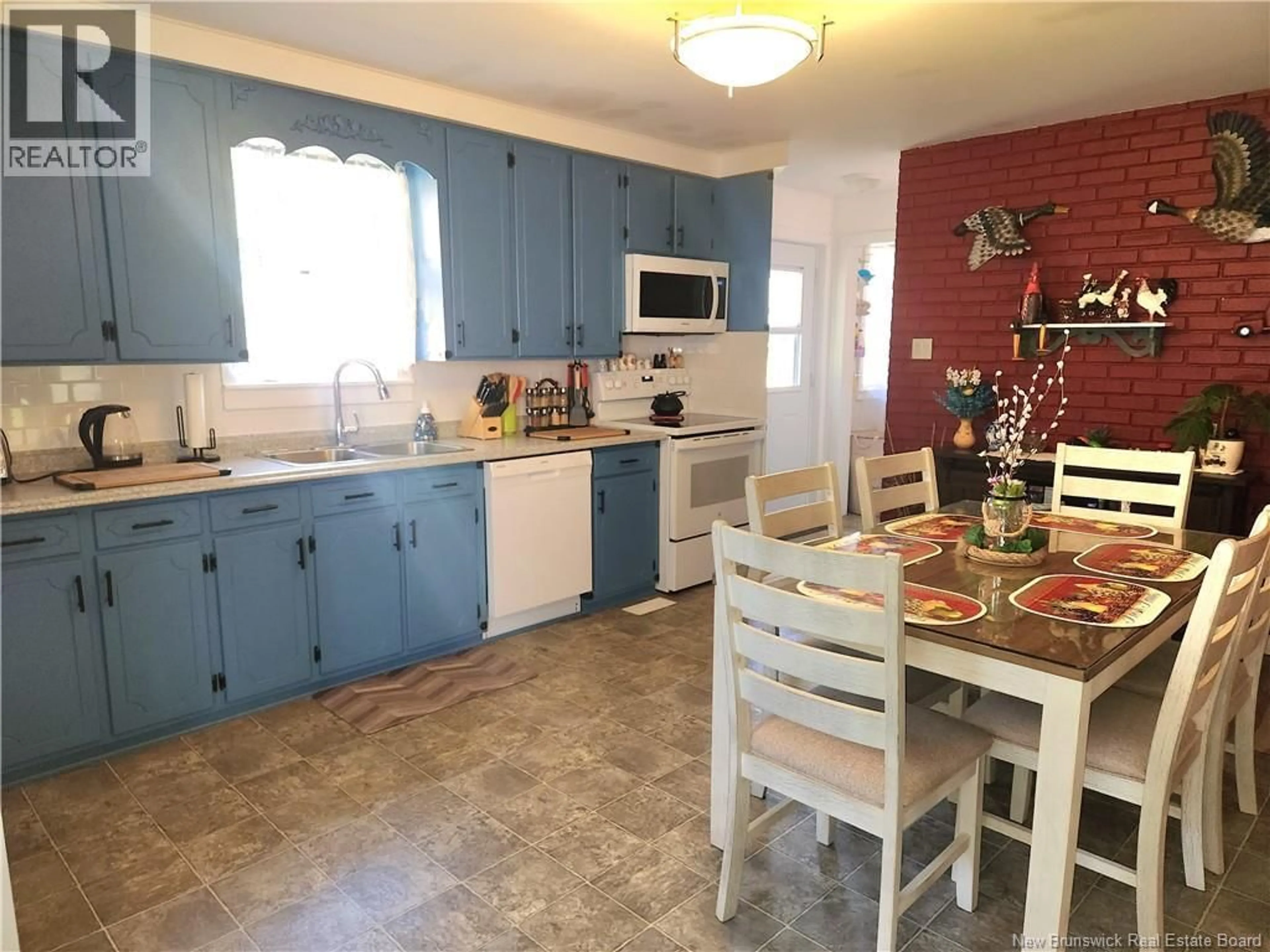 Open concept kitchen, ceramic/tile floor for 5 SUTTHERY DRIVE, Plaster Rock New Brunswick E7G4B7
