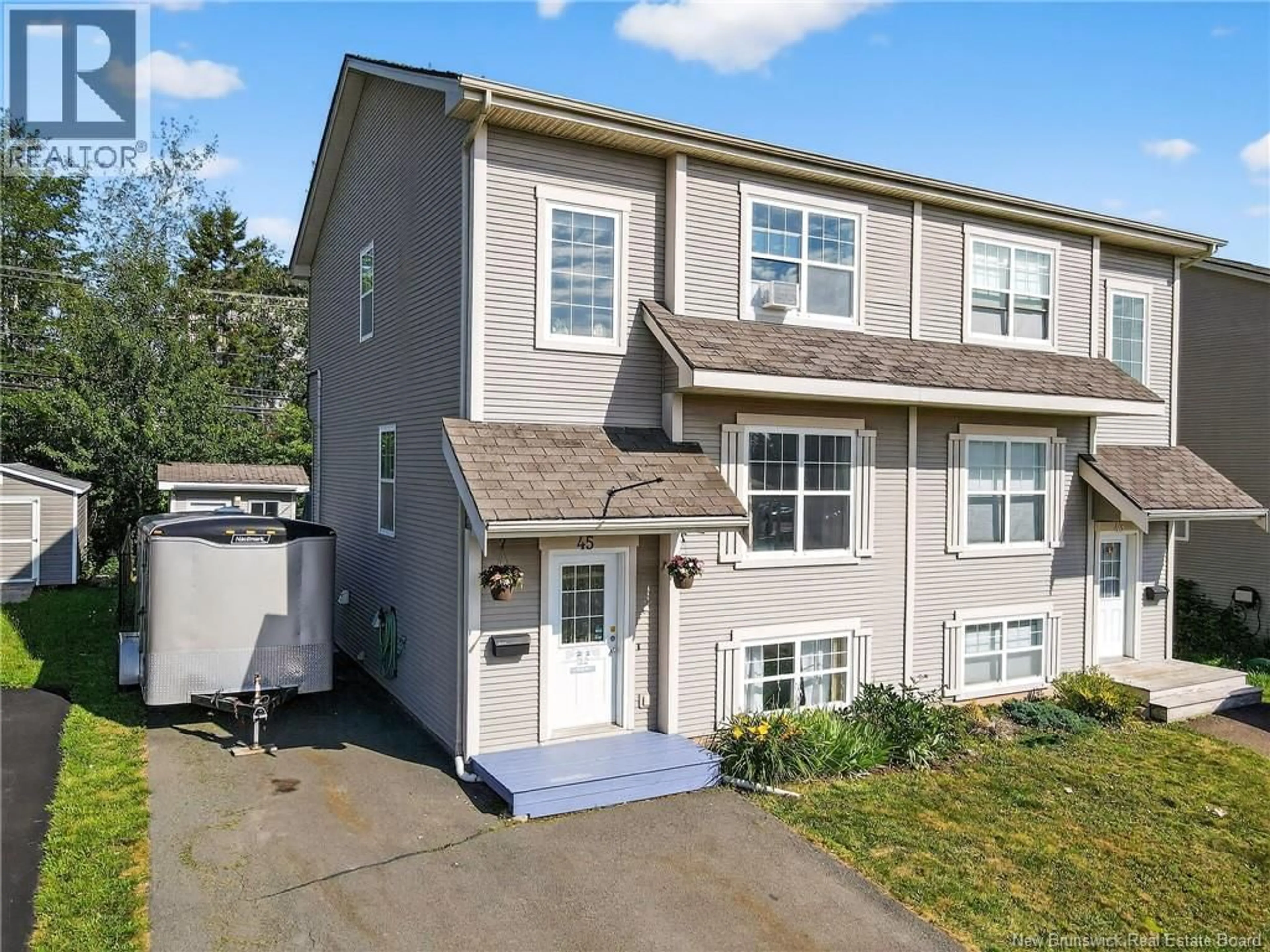 Home with vinyl exterior material, street for 45 SUNSHINE DRIVE, Moncton New Brunswick E1G2A3