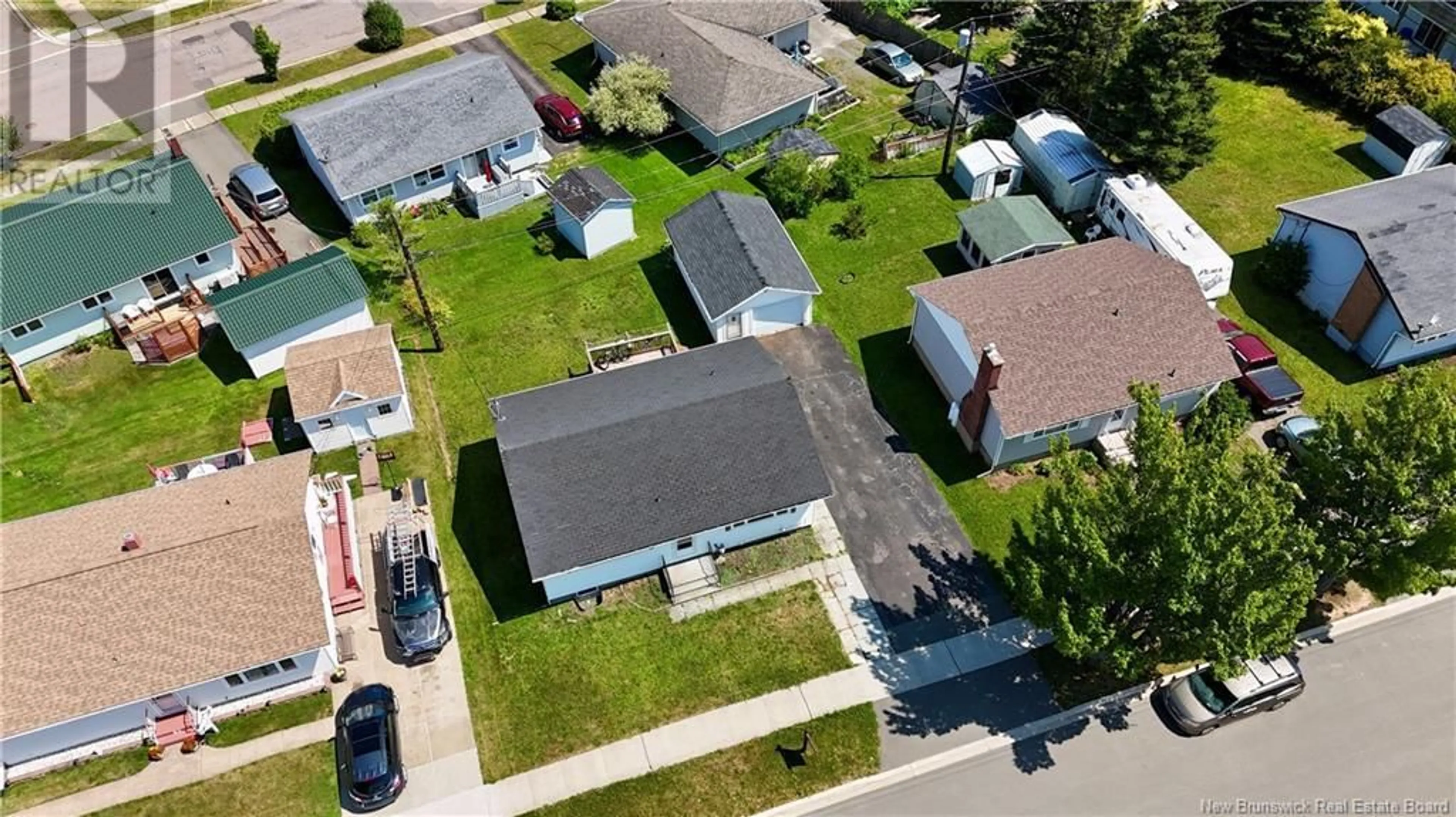A pic from outside/outdoor area/front of a property/back of a property/a pic from drone, street for 51 WINDEMERE DRIVE, Moncton New Brunswick E1C4L2