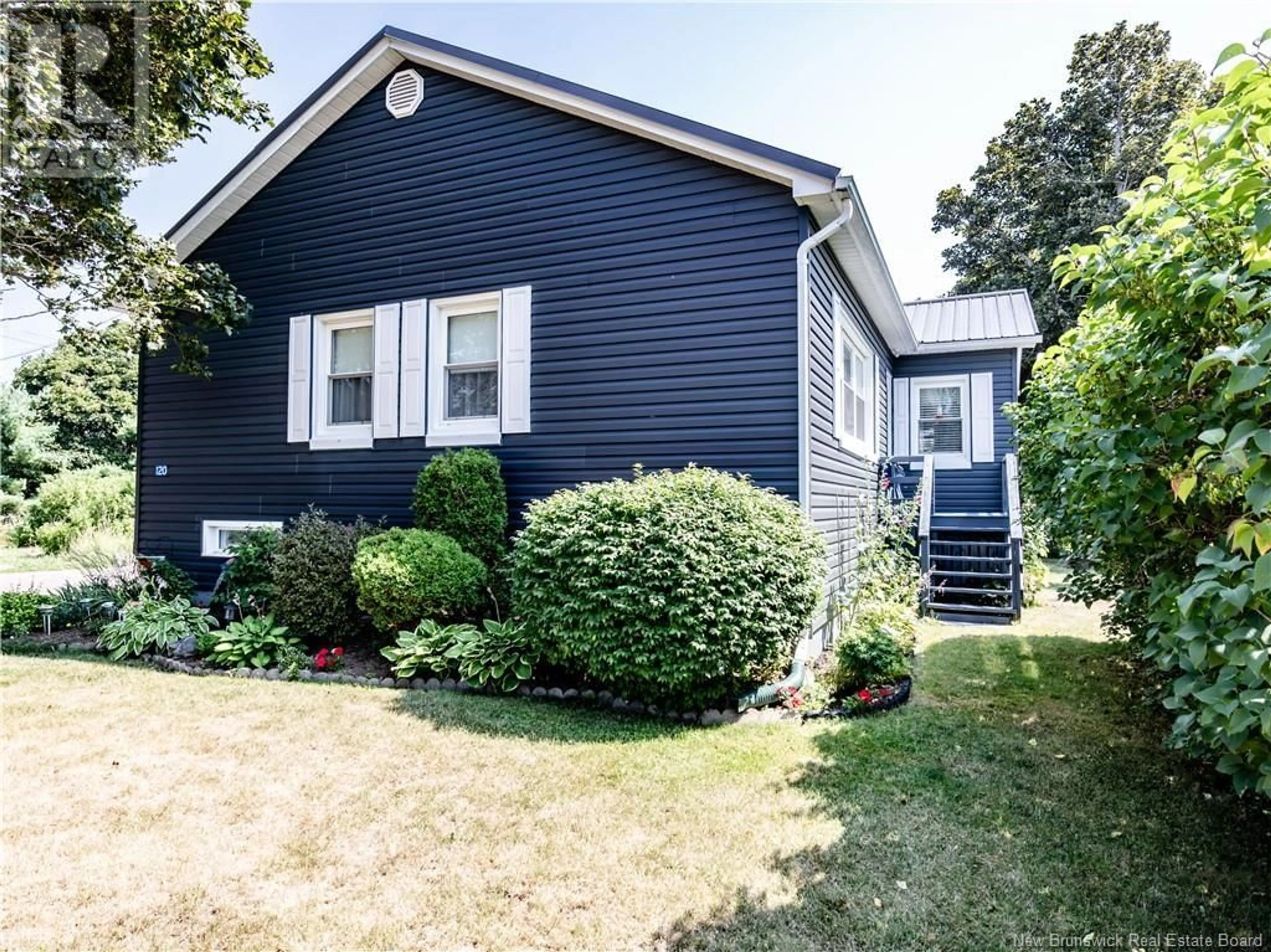 Home with vinyl exterior material, street for 120 ACADIE, Richibucto New Brunswick E4W3V9
