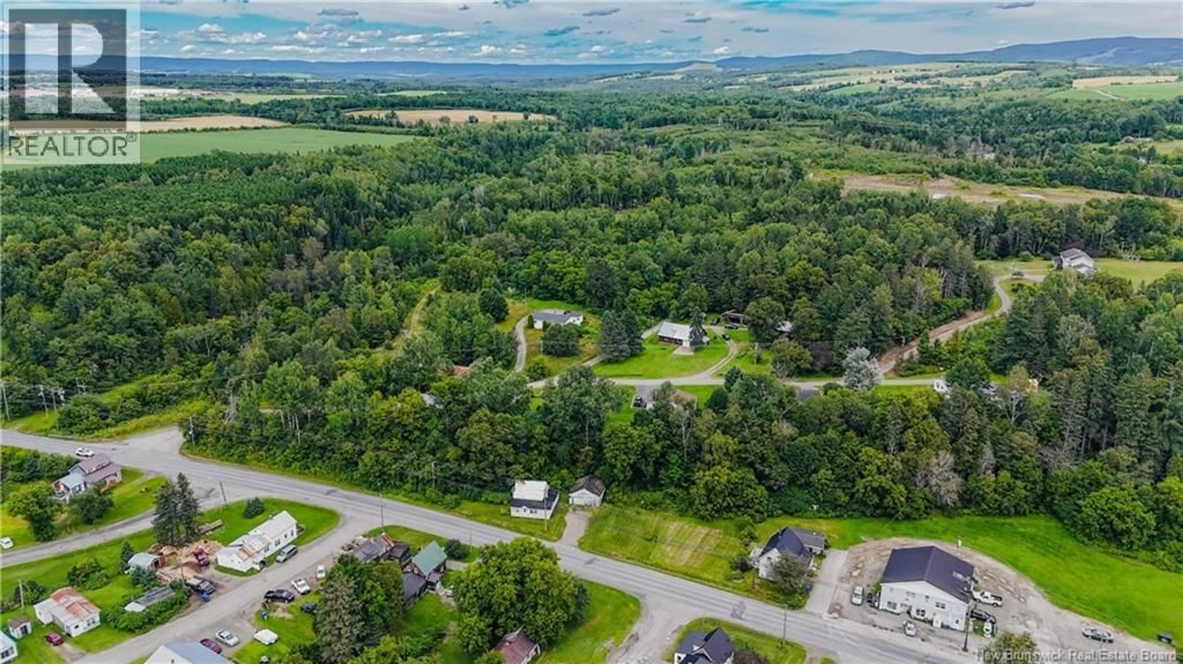 A pic from outside/outdoor area/front of a property/back of a property/a pic from drone, unknown for 9680 ROUTE 105, Beechwood New Brunswick E7J1Y1