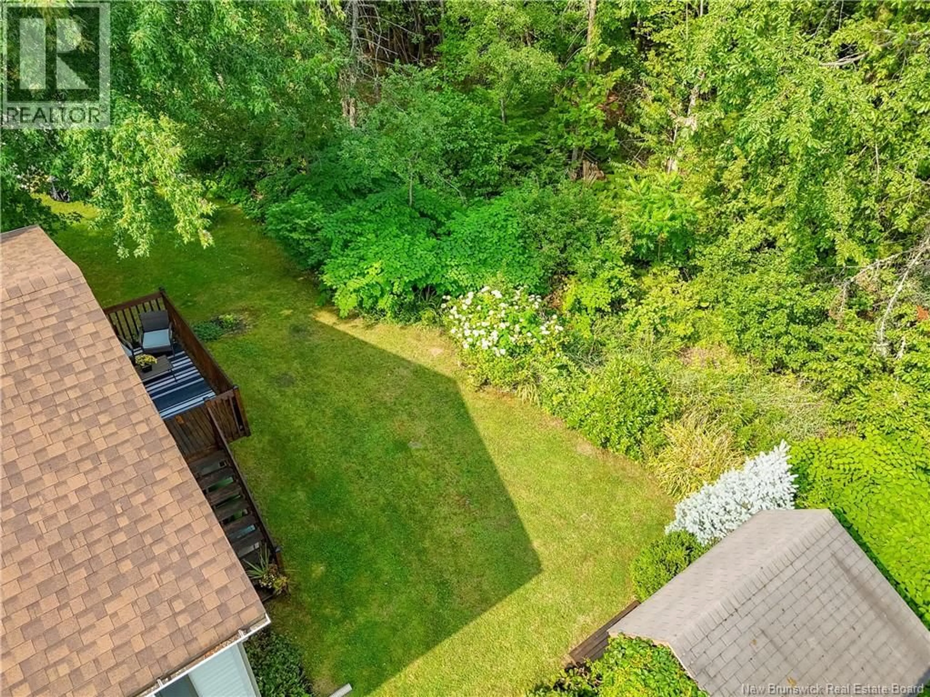A pic from outside/outdoor area/front of a property/back of a property/a pic from drone, forest/trees view for 4 DEWITT ACRES, Fredericton New Brunswick E3A6S2