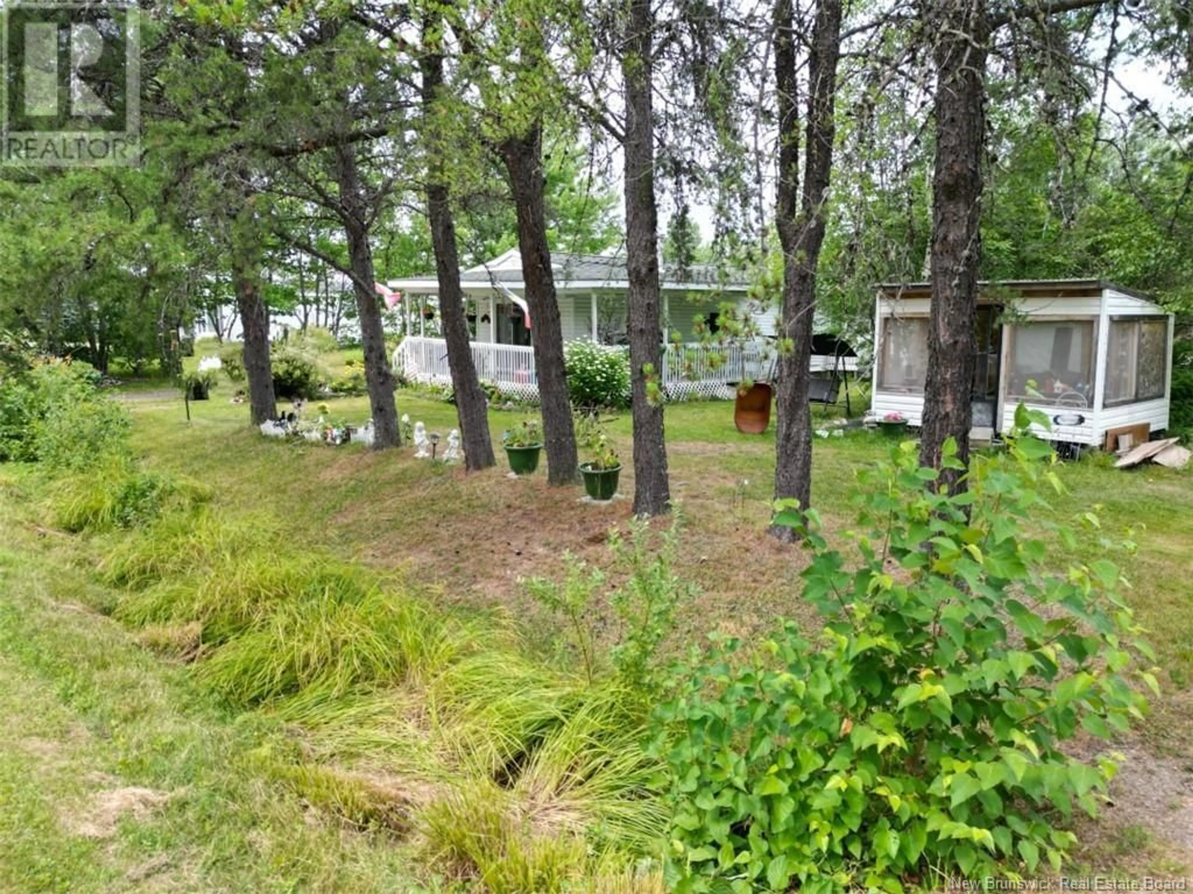 A pic from outside/outdoor area/front of a property/back of a property/a pic from drone, forest/trees view for 10 POIRIER, Poirier Subdivision New Brunswick E8L1V6