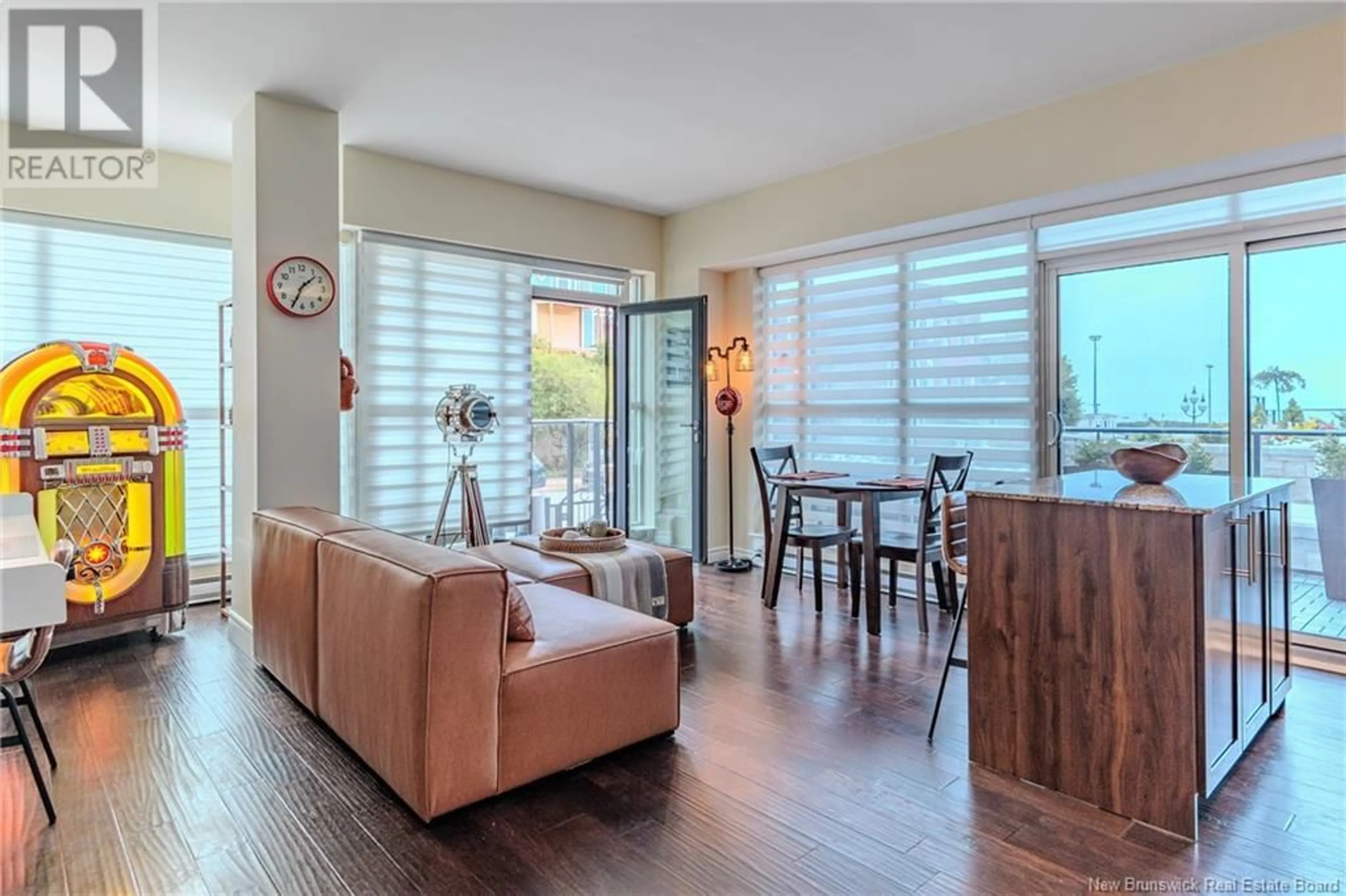 Living room with furniture, wood/laminate floor for 206 - 243 PRINCE WILLIAM STREET, Saint John New Brunswick E2L0C6