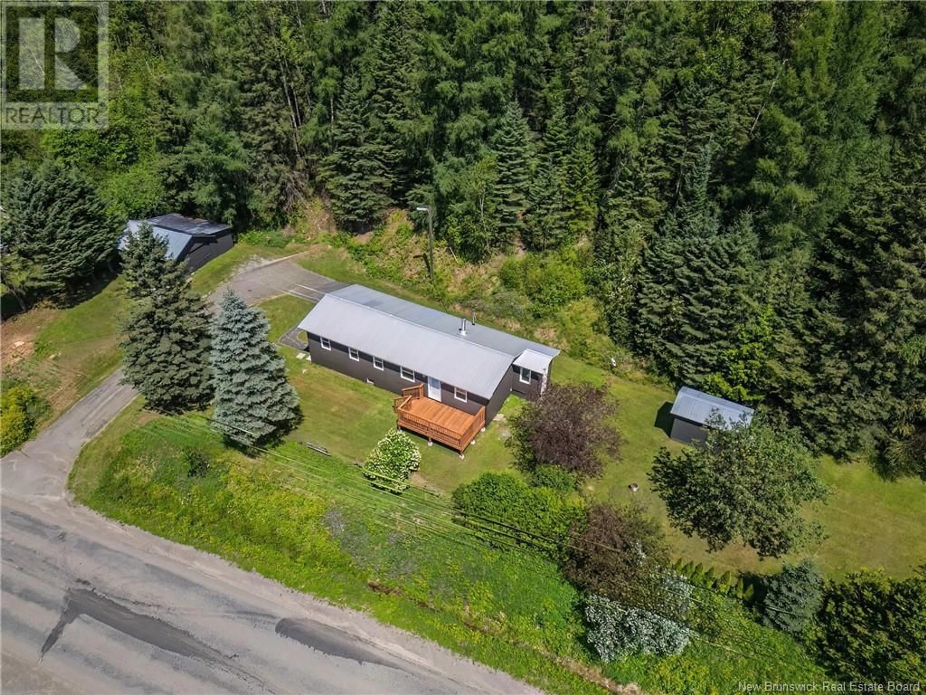 A pic from outside/outdoor area/front of a property/back of a property/a pic from drone, forest/trees view for 3068 ROUTE 108, New Denmark New Brunswick E7G2T2