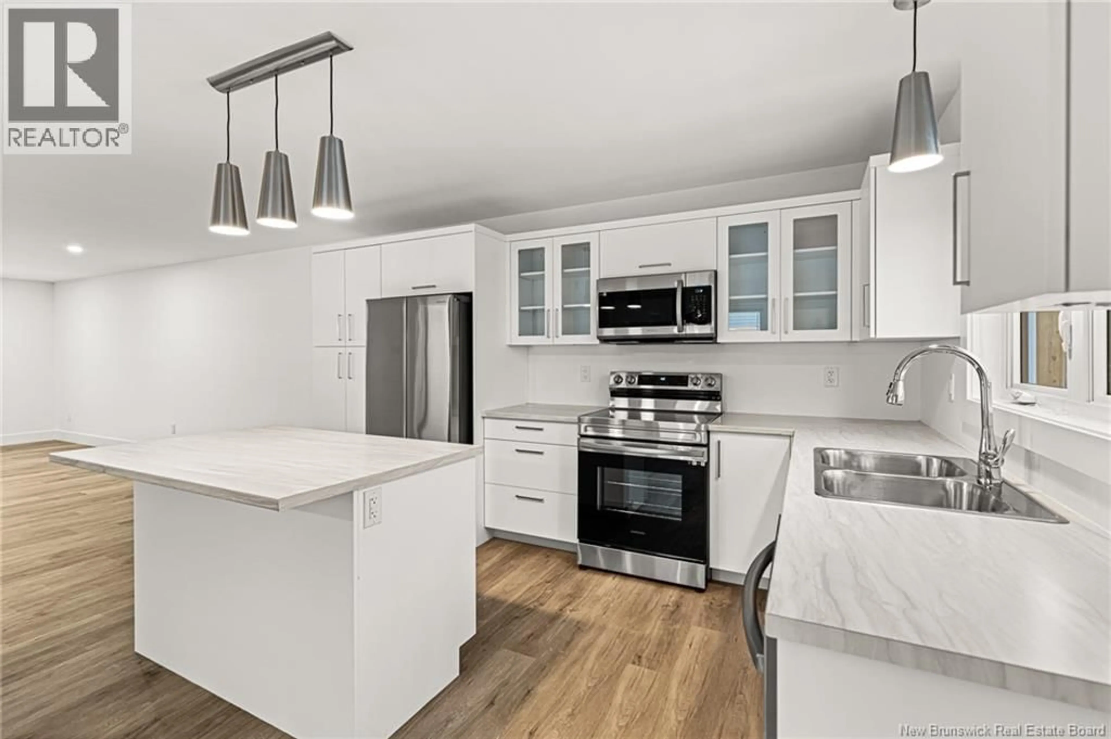 Open concept kitchen, ceramic/tile floor for 250 JACQUES STREET, Shediac New Brunswick E4P2B7