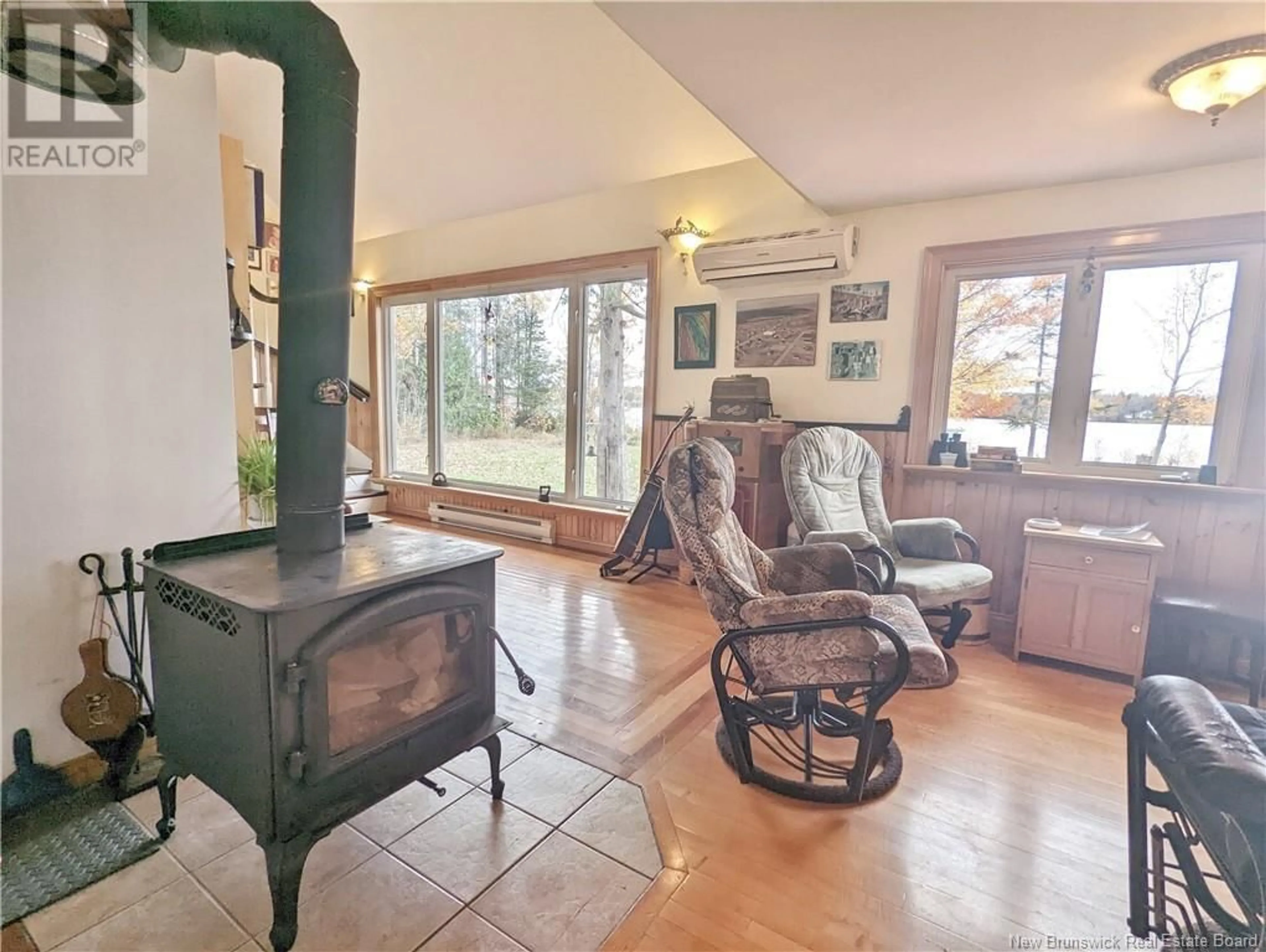 Living room with furniture, unknown for 1828 CHEM. COWANS CREEK, Landry Office New Brunswick E8S1G5