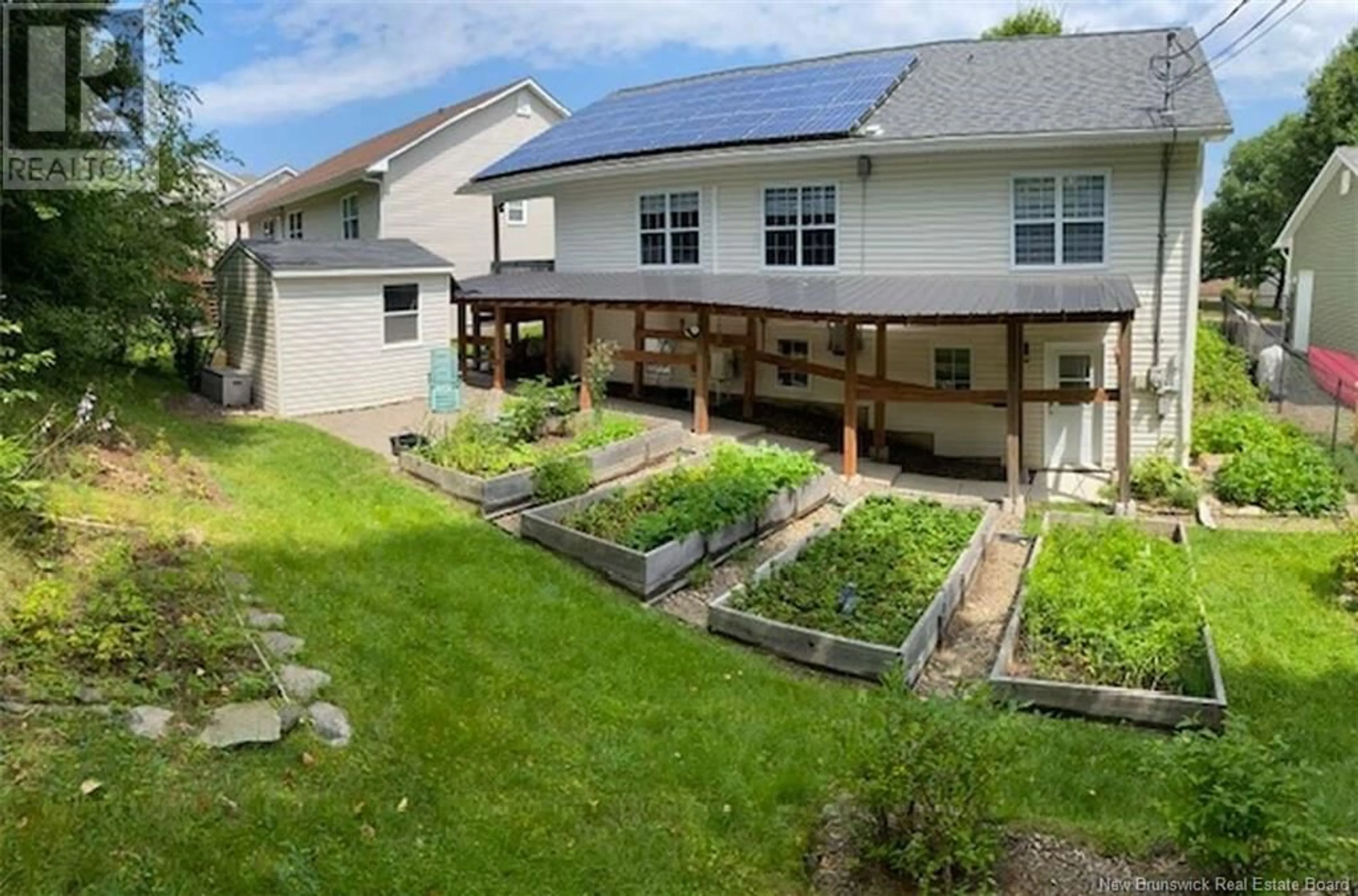 A pic from outside/outdoor area/front of a property/back of a property/a pic from drone, unknown for 31 THOMAS COURT, Fredericton New Brunswick E3A9Y4