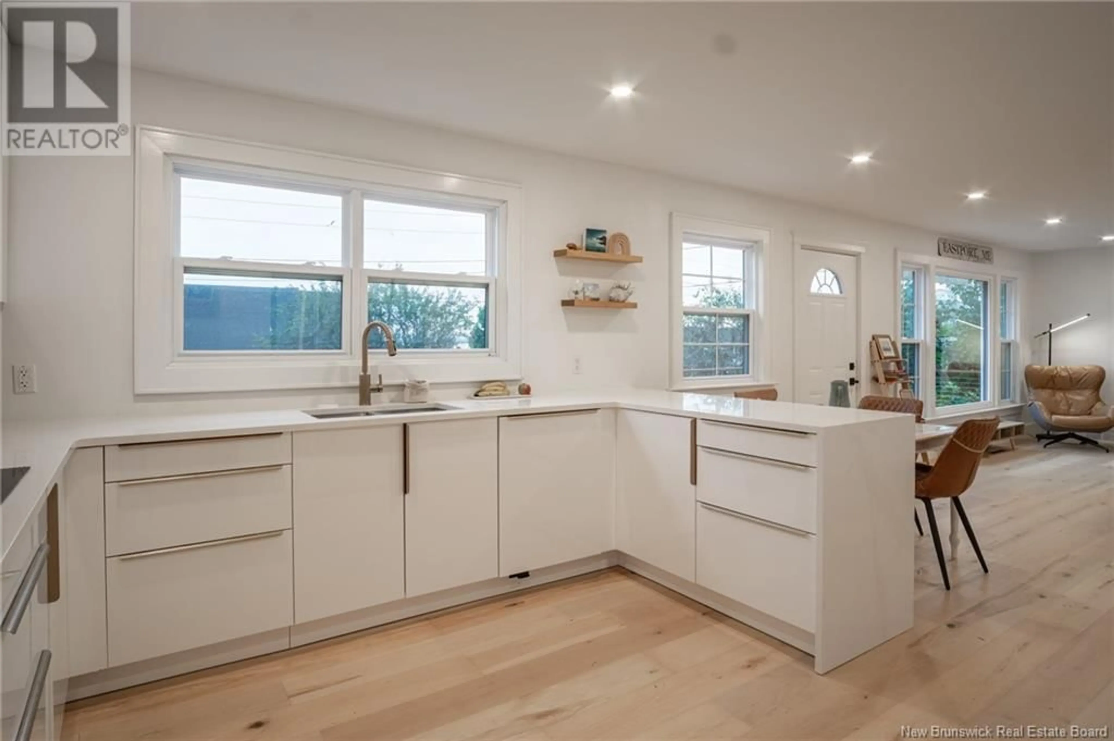 Open concept kitchen, wood/laminate floor for 66 WATER STREET, Saint Andrews New Brunswick E5B1A5