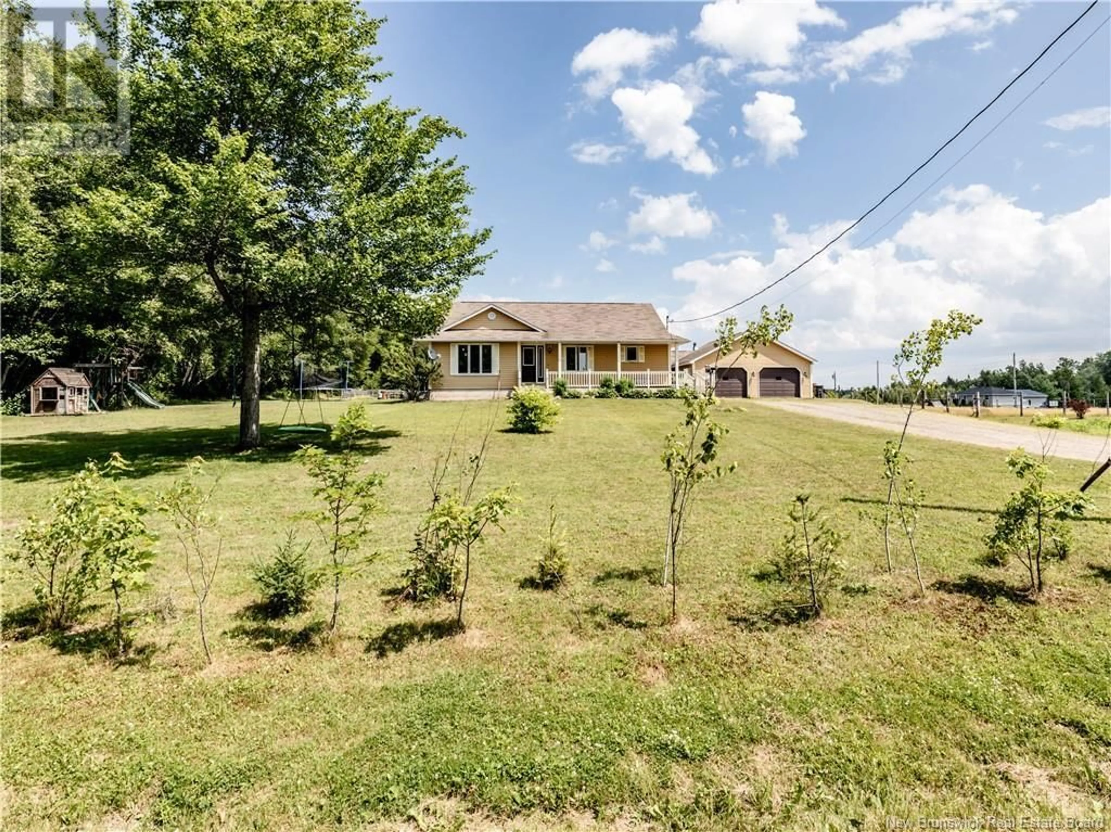 A pic from outside/outdoor area/front of a property/back of a property/a pic from drone, unknown for 18 PETITE BRANCHE RD, Acadieville New Brunswick E4Y1N2
