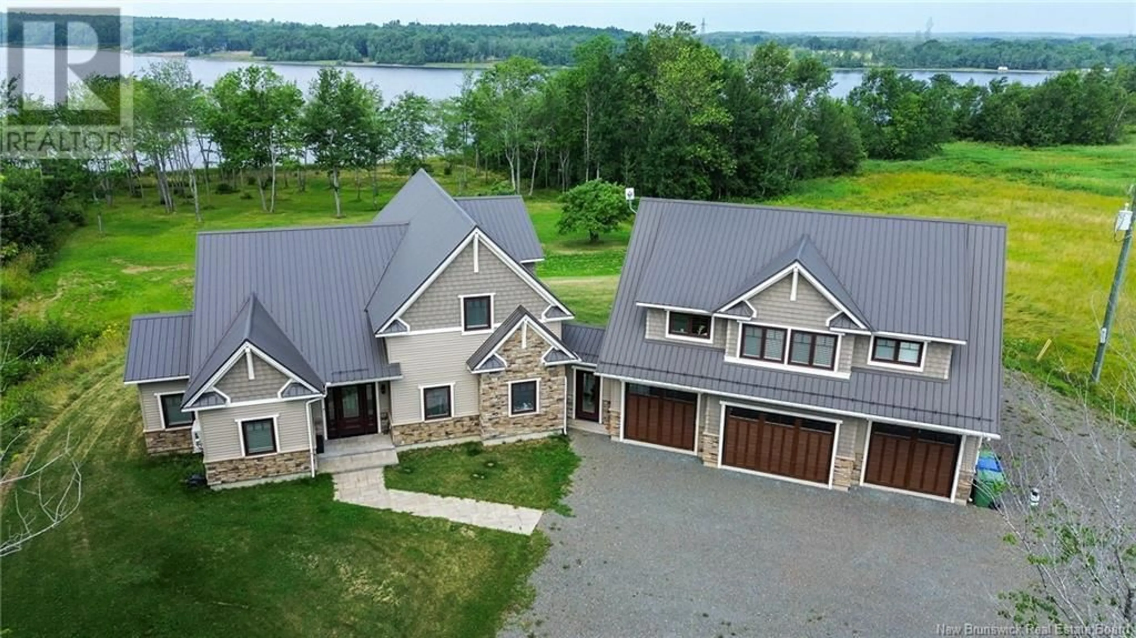A pic from outside/outdoor area/front of a property/back of a property/a pic from drone, water/lake/river/ocean view for 192 CHAPMAN ROAD, Newcastle Creek New Brunswick E4B2M1