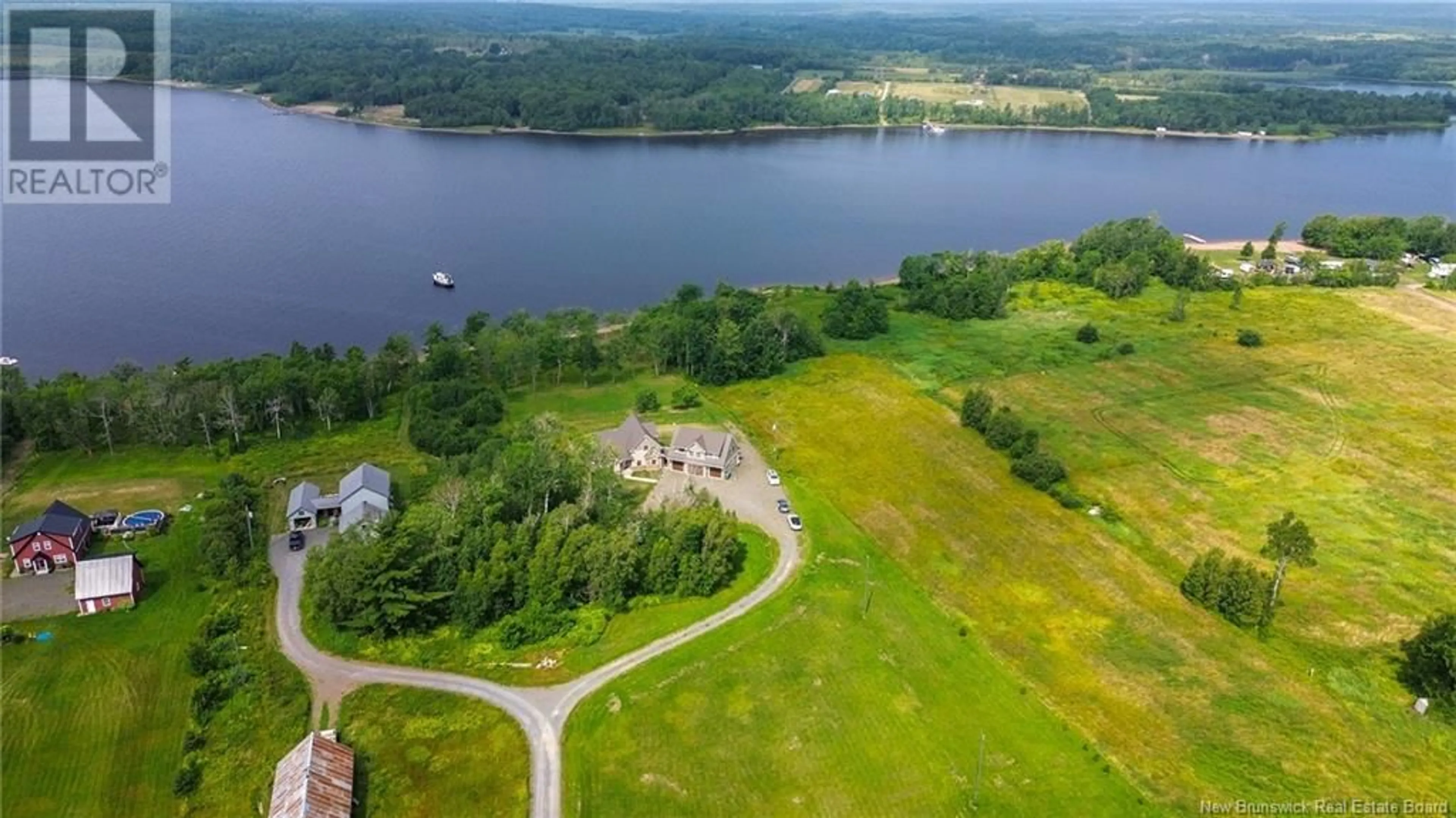 A pic from outside/outdoor area/front of a property/back of a property/a pic from drone, water/lake/river/ocean view for 192 CHAPMAN ROAD, Newcastle Creek New Brunswick E4B2M1