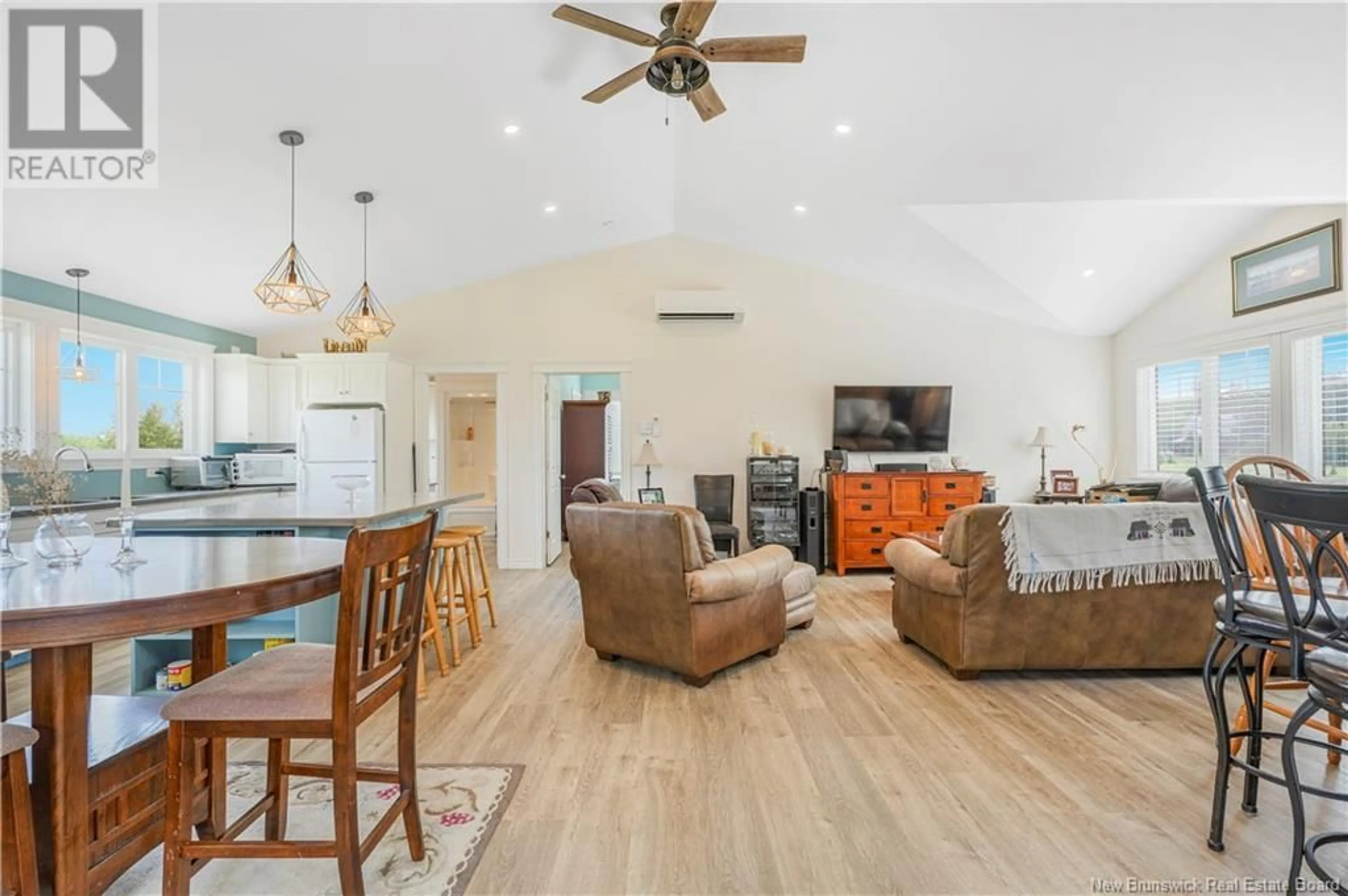 Living room with furniture, wood/laminate floor for 192 CHAPMAN ROAD, Newcastle Creek New Brunswick E4B2M1