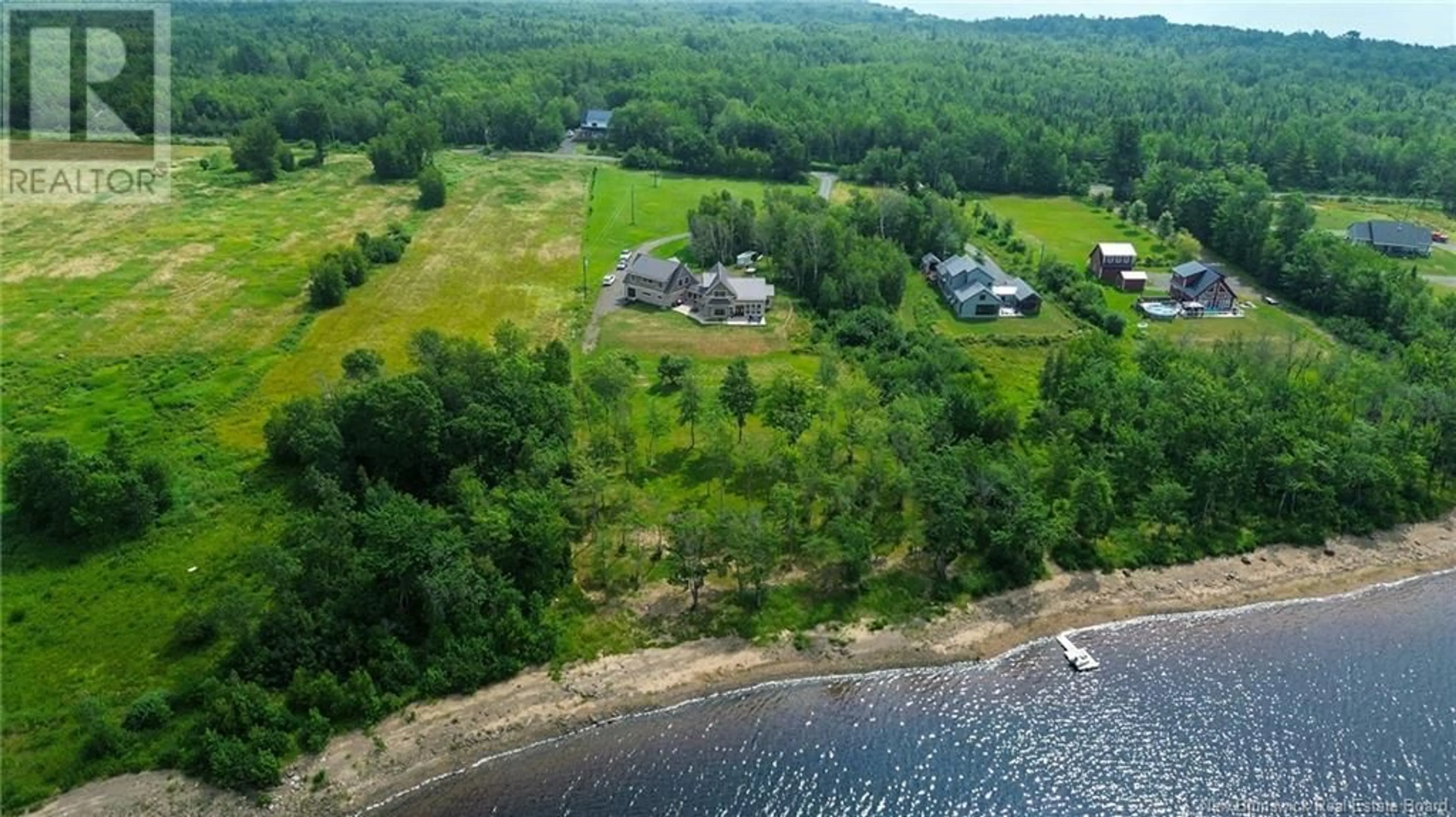 A pic from outside/outdoor area/front of a property/back of a property/a pic from drone, water/lake/river/ocean view for 192 CHAPMAN ROAD, Newcastle Creek New Brunswick E4B2M1