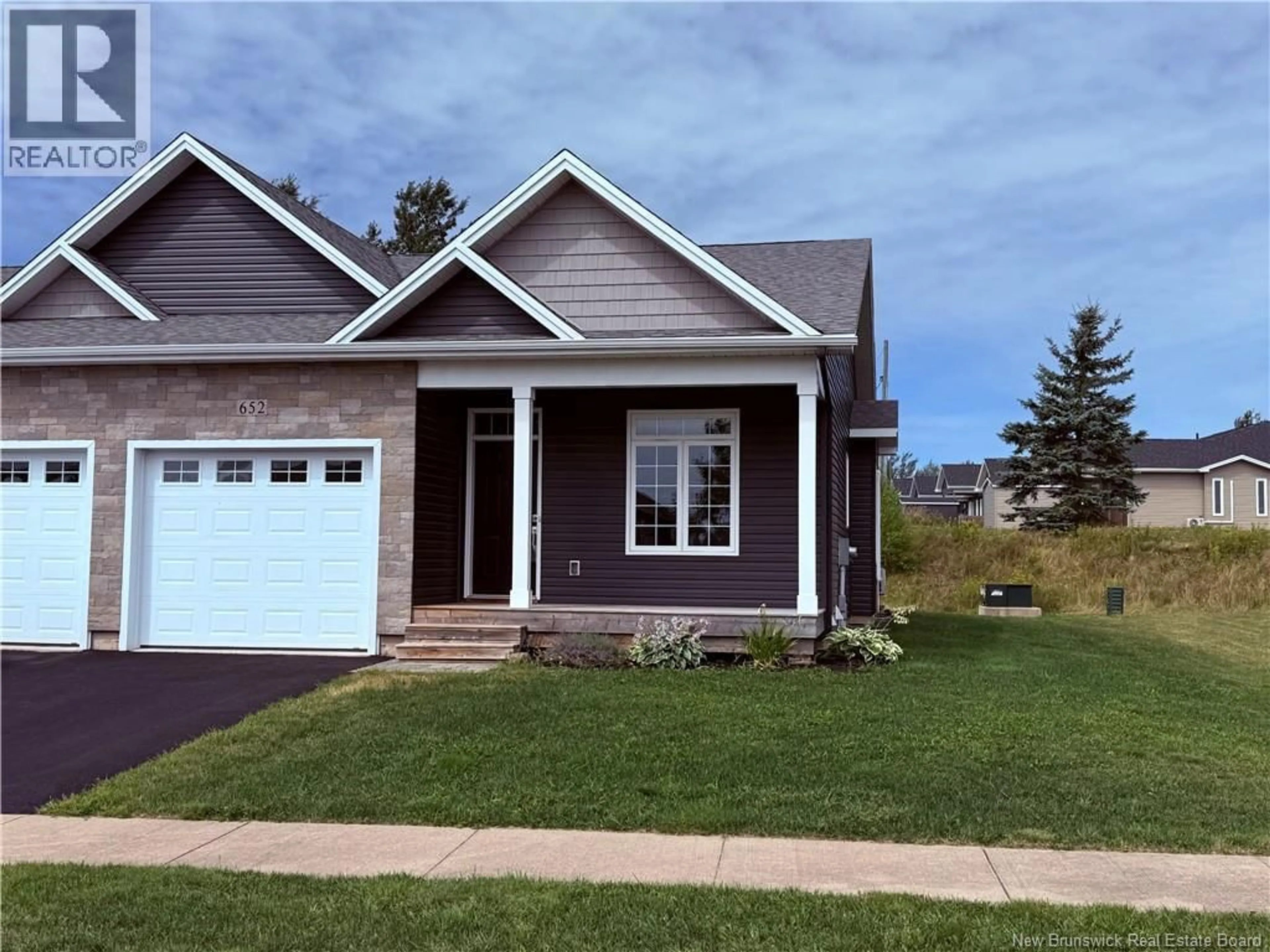 Home with vinyl exterior material, street for 652 ROYAL OAKS BOULEVARD, Moncton New Brunswick E1H3S7