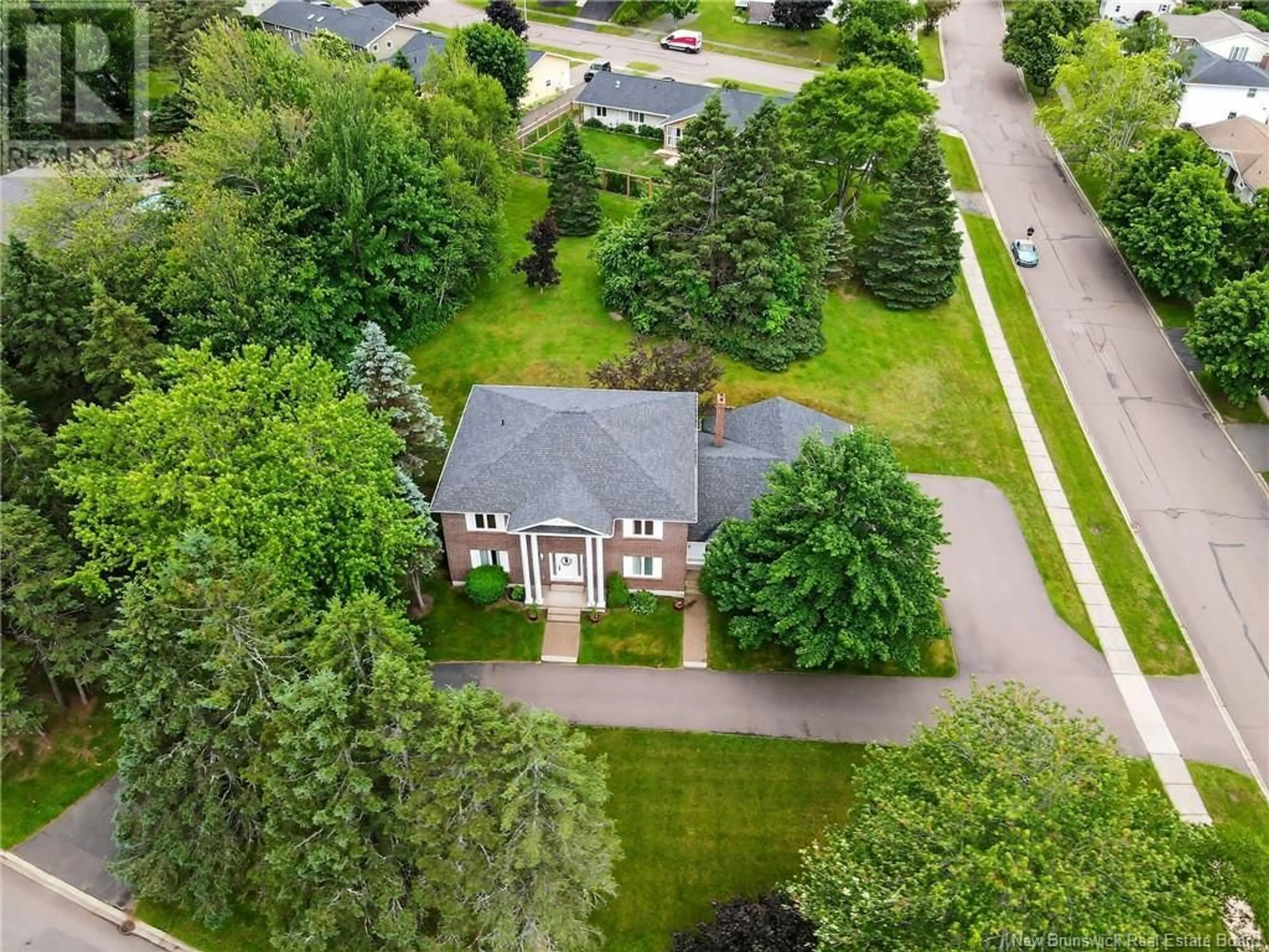 A pic from outside/outdoor area/front of a property/back of a property/a pic from drone, street for 20 SPRUCE GROVE BOULEVARD, Moncton New Brunswick E1A6Y8