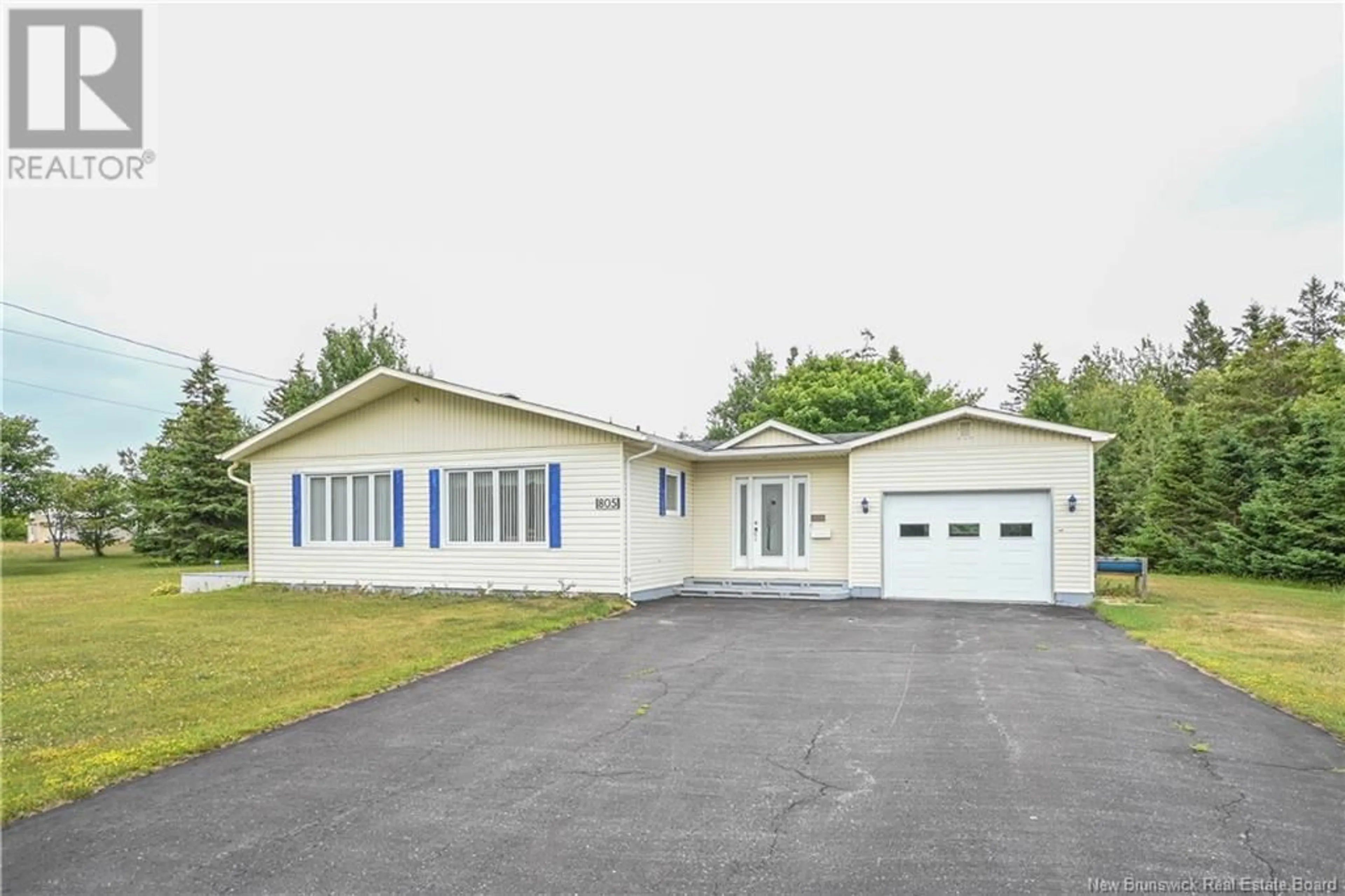 Home with vinyl exterior material, street for 805 CHIASSON ROAD, Chiasson Office New Brunswick E8S2W9