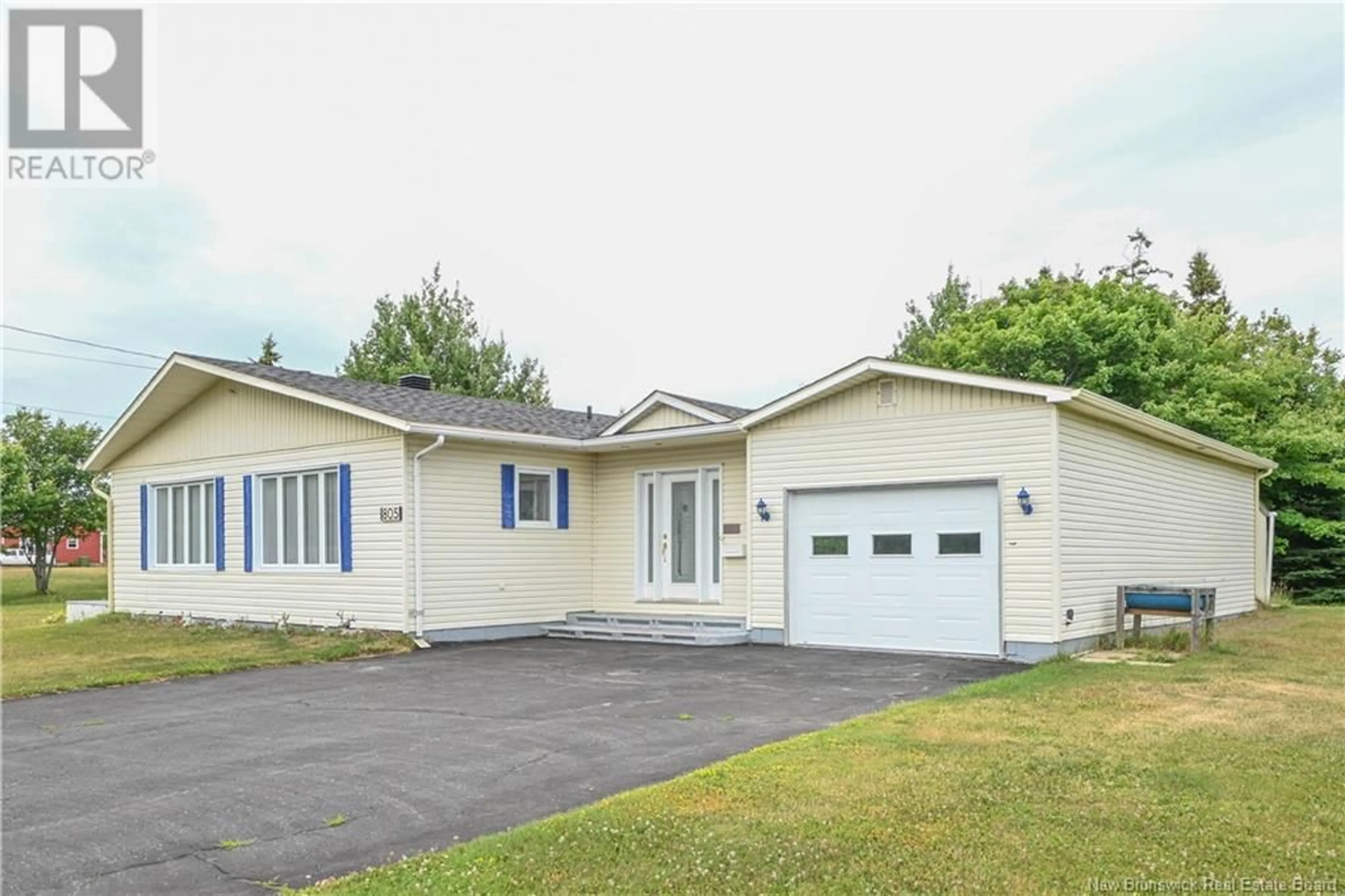 Home with vinyl exterior material, street for 805 CHIASSON ROAD, Chiasson Office New Brunswick E8S2W9
