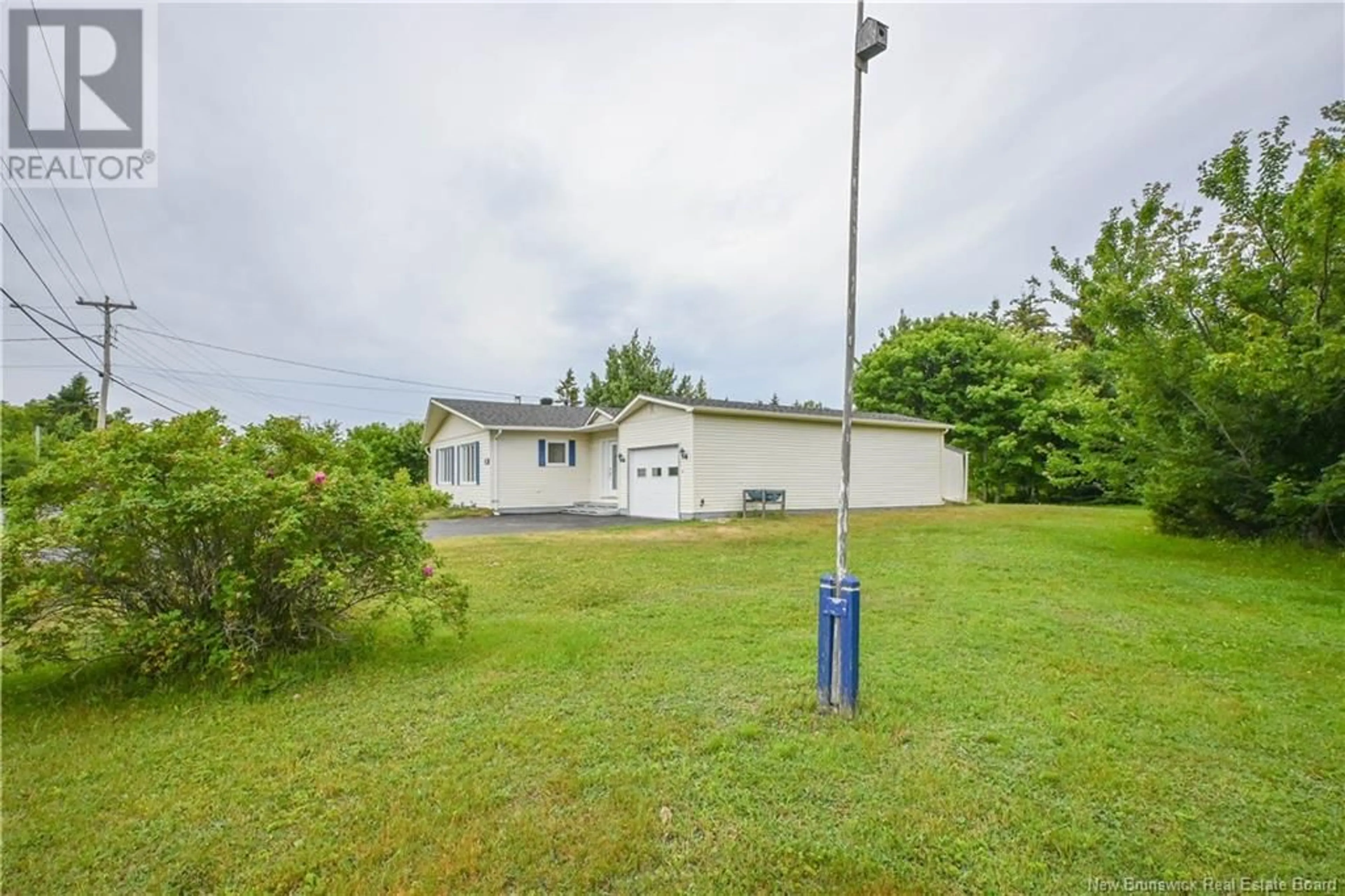 A pic from outside/outdoor area/front of a property/back of a property/a pic from drone, unknown for 805 CHIASSON ROAD, Chiasson Office New Brunswick E8S2W9