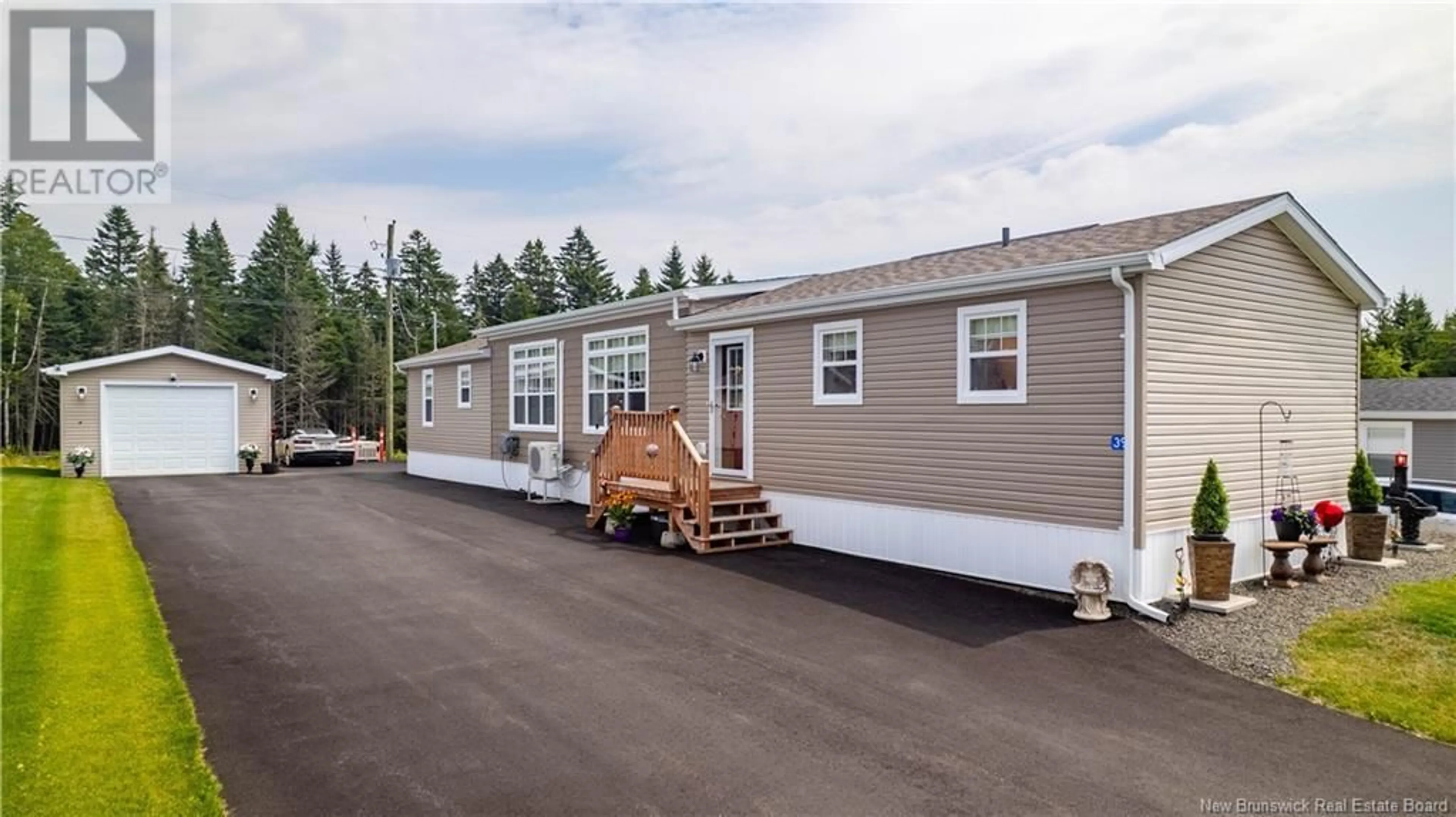 Home with vinyl exterior material, street for 39 HARVEST LANE, St George New Brunswick E5C0J3