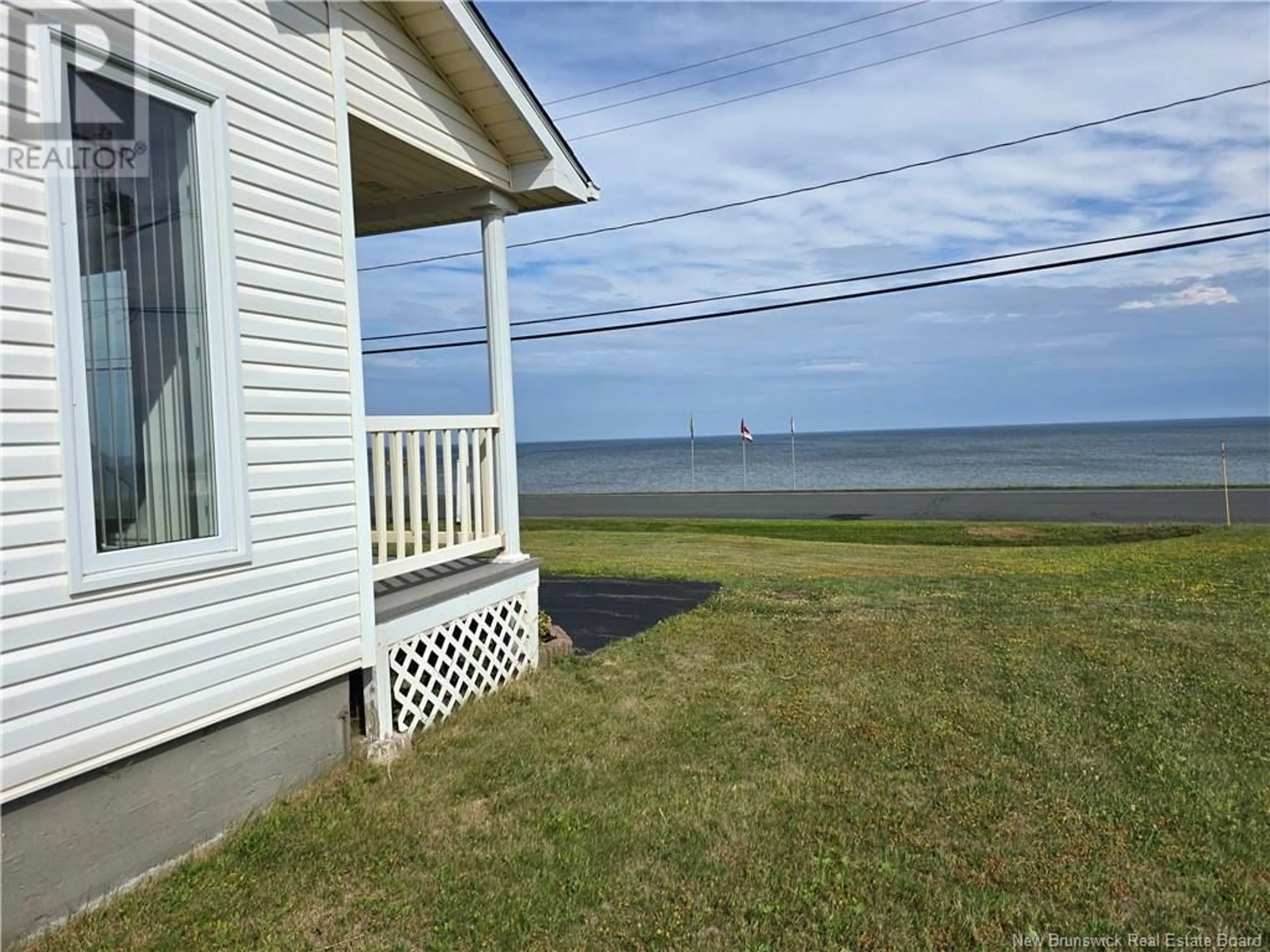 A pic from outside/outdoor area/front of a property/back of a property/a pic from drone, water/lake/river/ocean view for 3163 RTE 305, Pigeon Hill New Brunswick E8T2V7