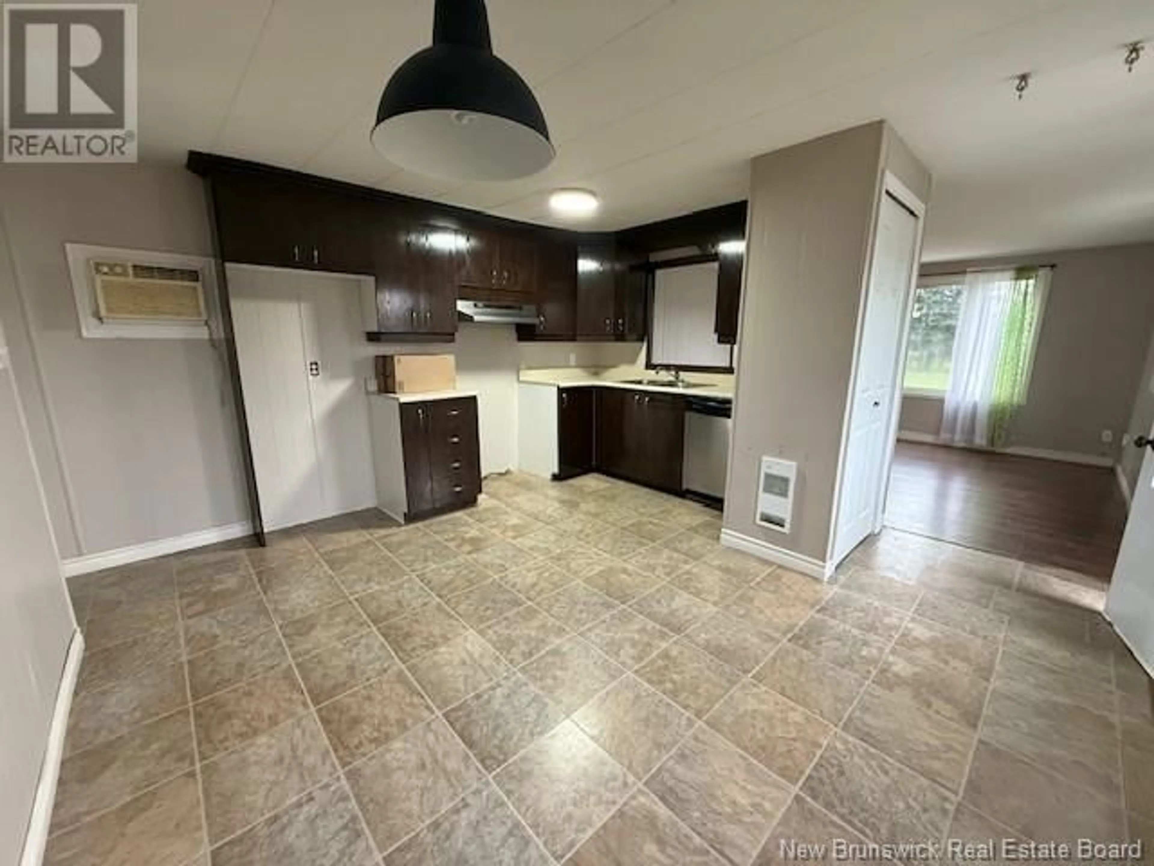 Open concept kitchen, ceramic/tile floor for 717 DES PIONNIERS AVENUE, Balmoral New Brunswick E8E1B3