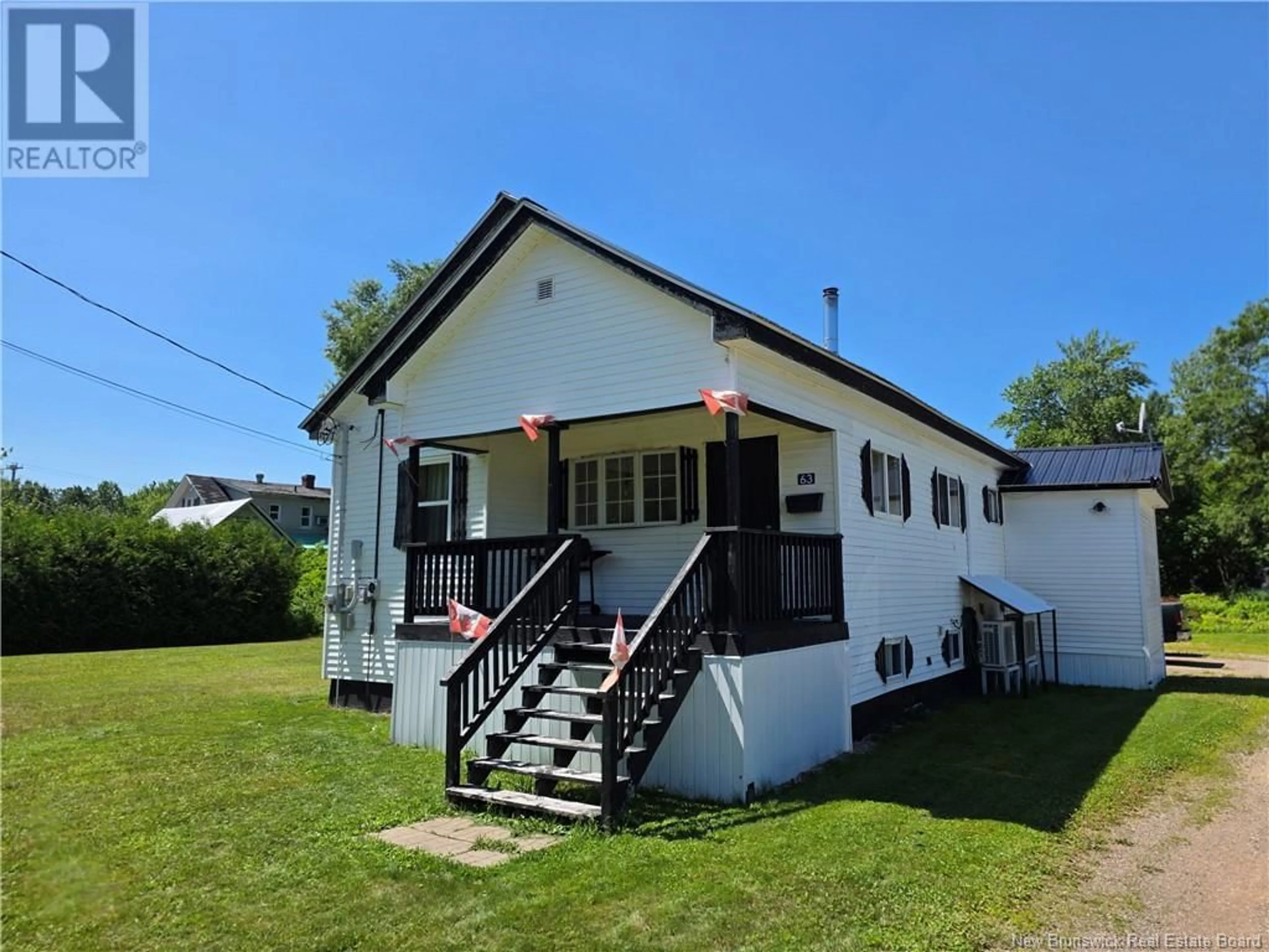 A pic from outside/outdoor area/front of a property/back of a property/a pic from drone, building for 63 FIRST AVENUE, McAdam New Brunswick E6J1S7