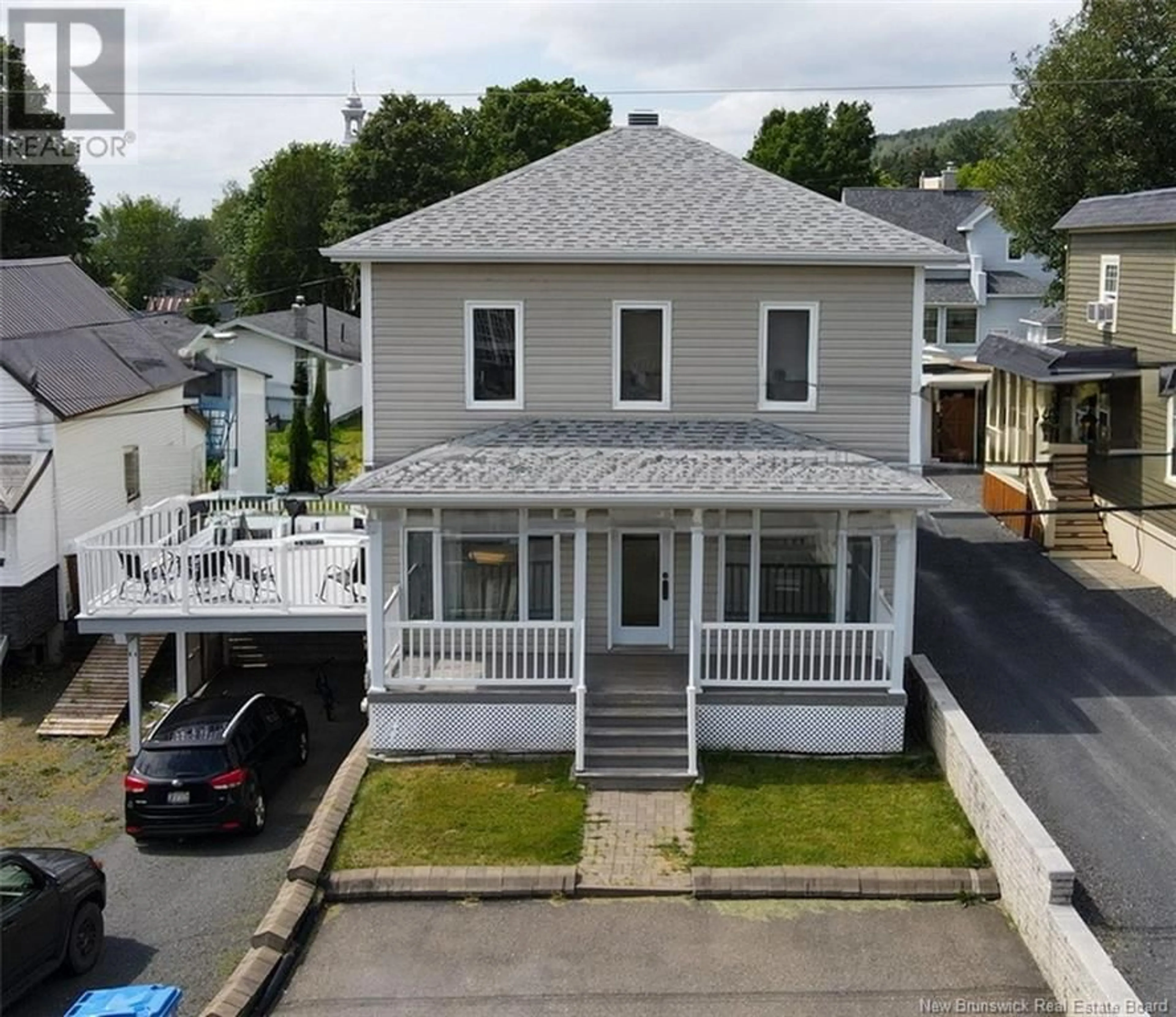 A pic from outside/outdoor area/front of a property/back of a property/a pic from drone, street for 8 MARGUERITE-THIBODEAU AVENUE, Edmundston New Brunswick E7C1C2