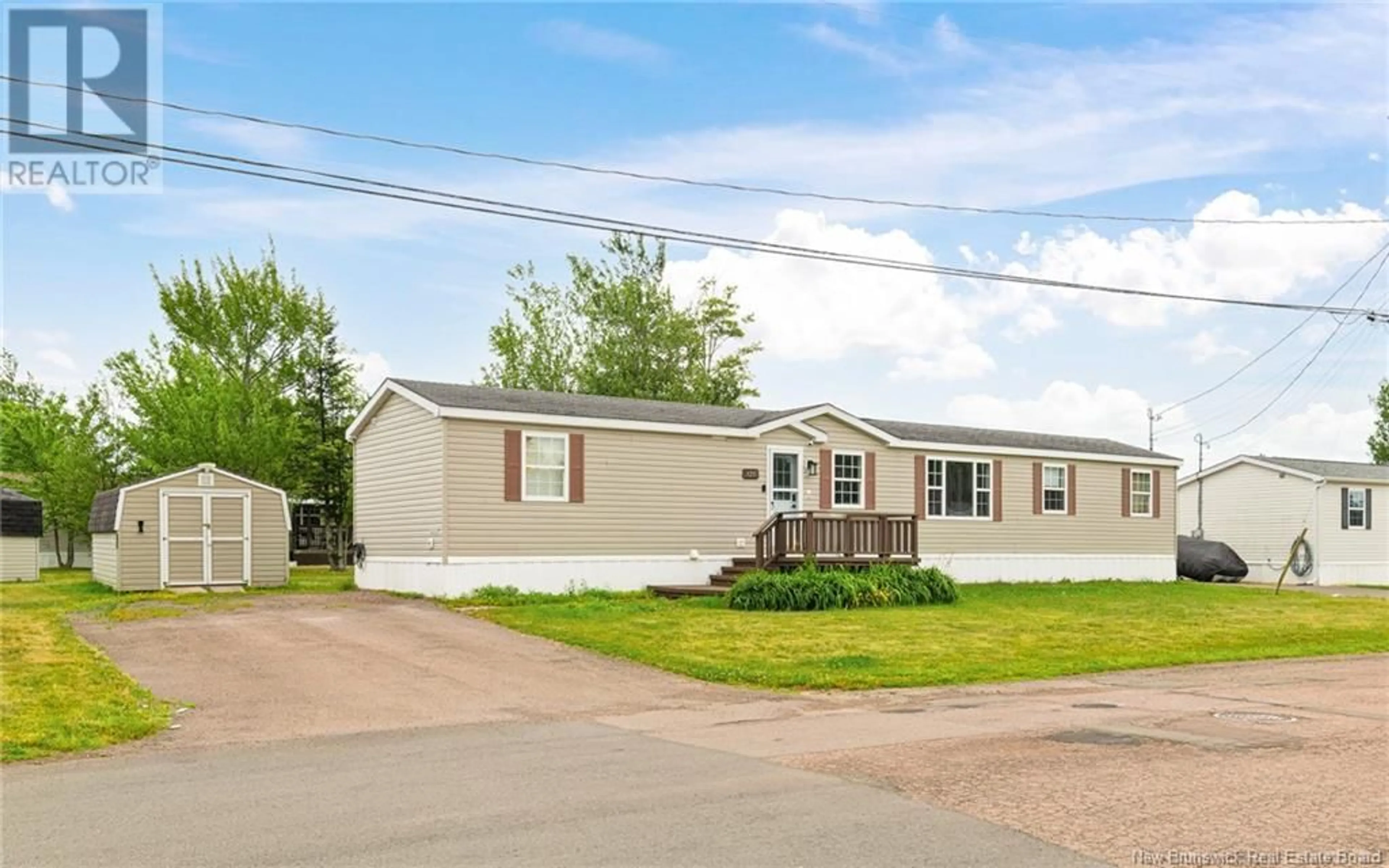 Home with vinyl exterior material, street for 125 NEPISIGUIT, Dieppe New Brunswick E1A7N1