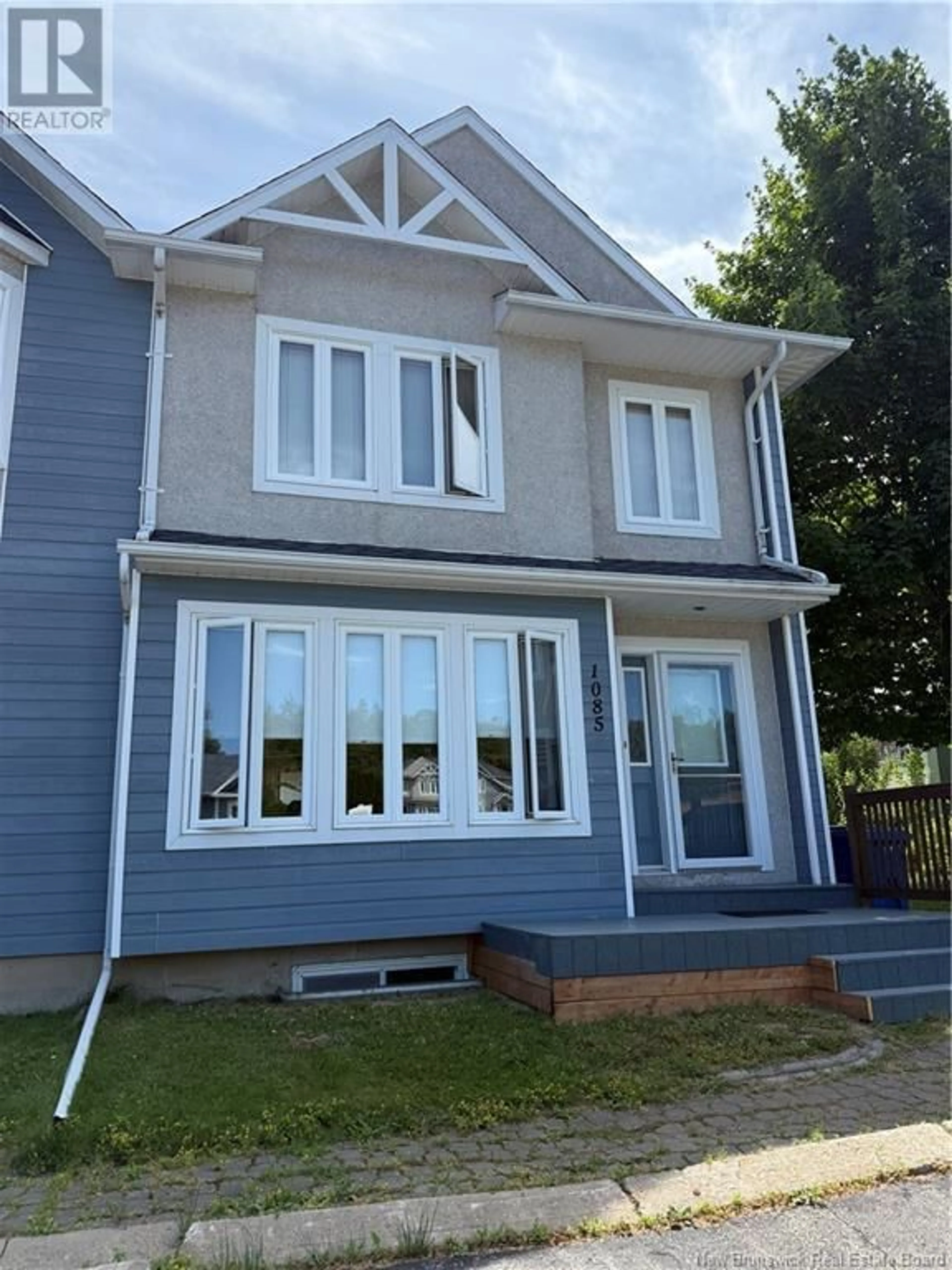 Home with vinyl exterior material, street for 1085 WESTBROOK COURT, Bathurst New Brunswick E2A4X1
