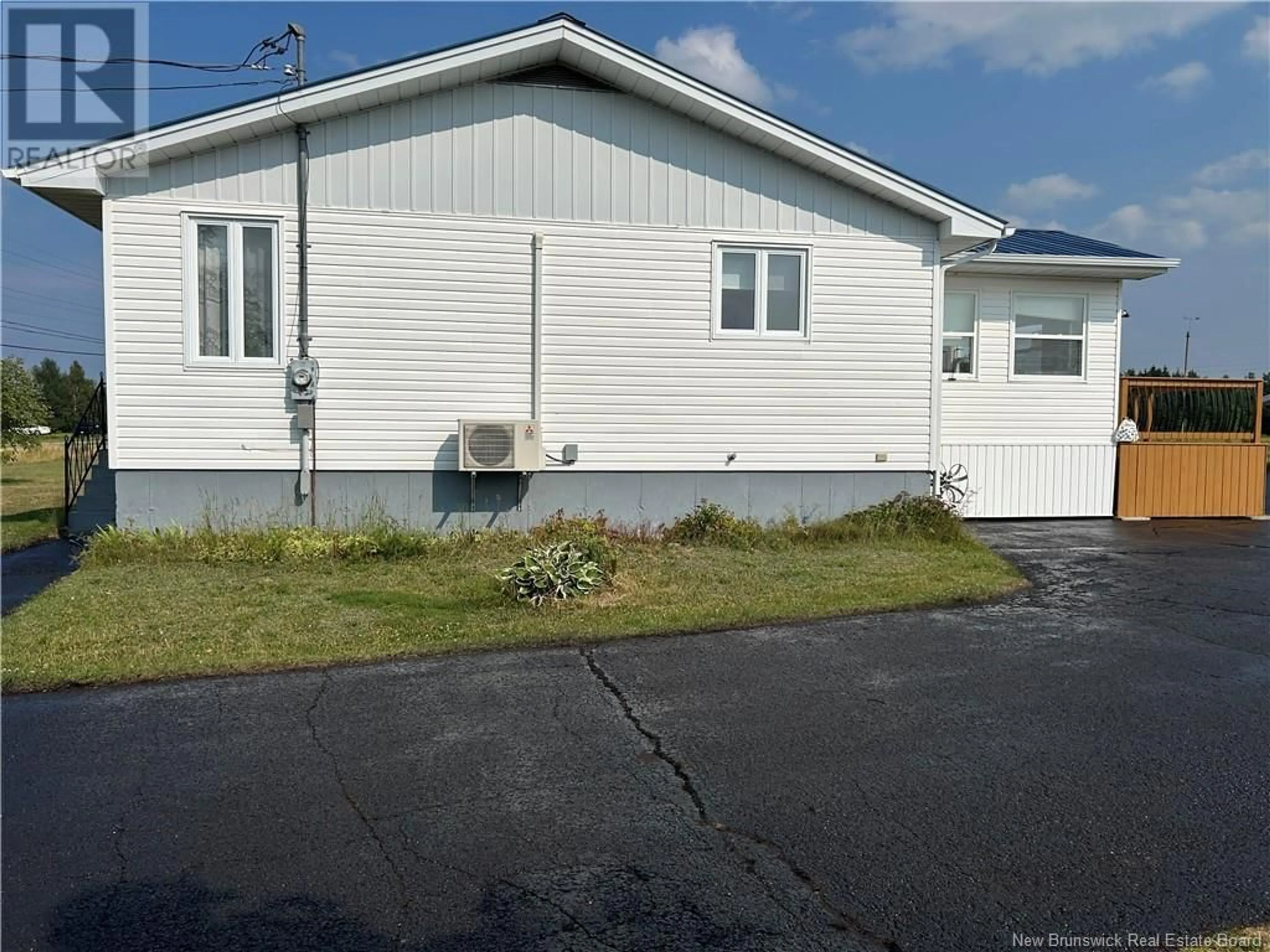 Home with vinyl exterior material, street for 654 ROUTE 355, Sainte-Rose New Brunswick E1X2W9