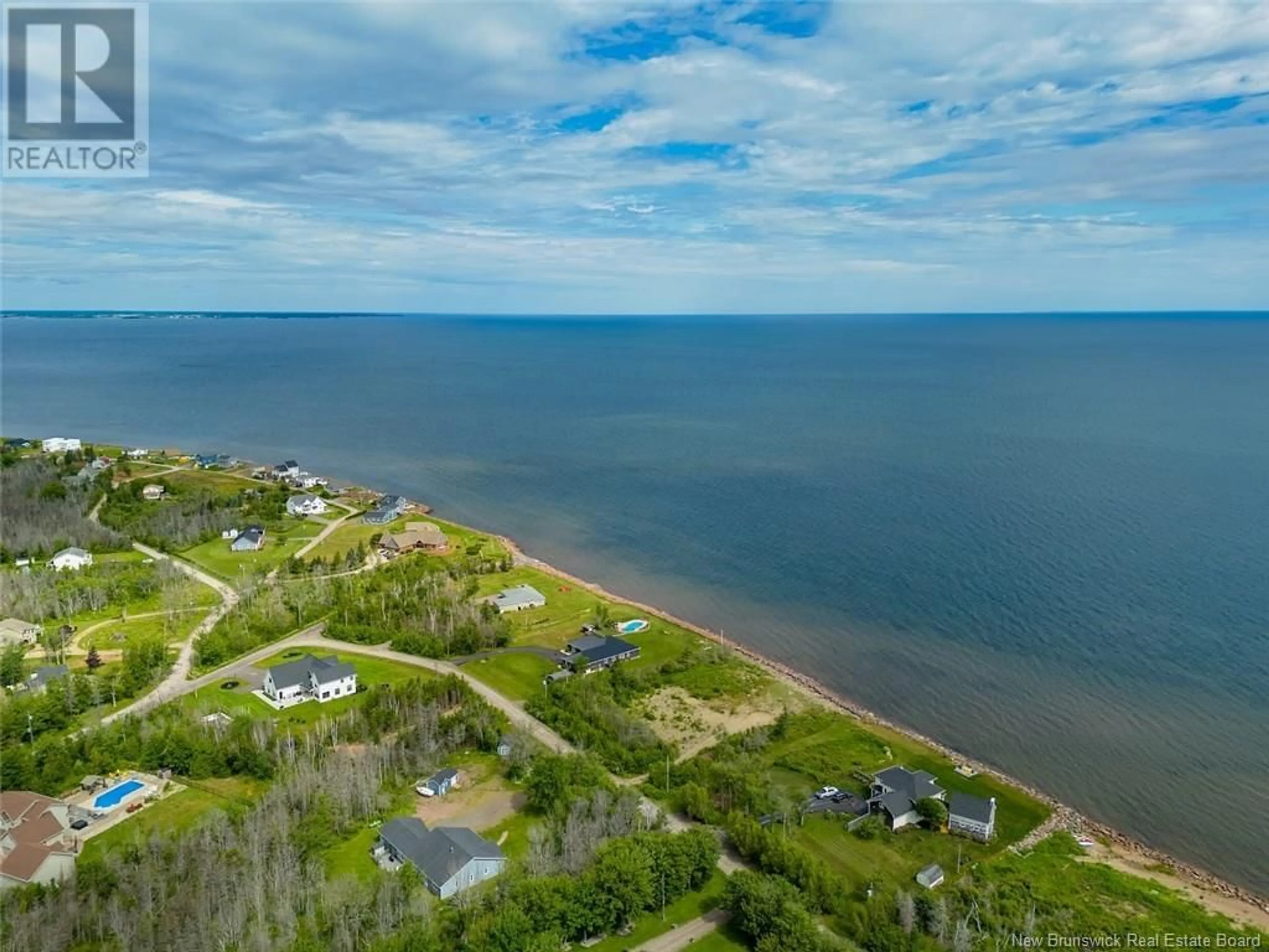A pic from outside/outdoor area/front of a property/back of a property/a pic from drone, water/lake/river/ocean view for 11 HERITAGE, Grand-Barachois New Brunswick E4P3X2