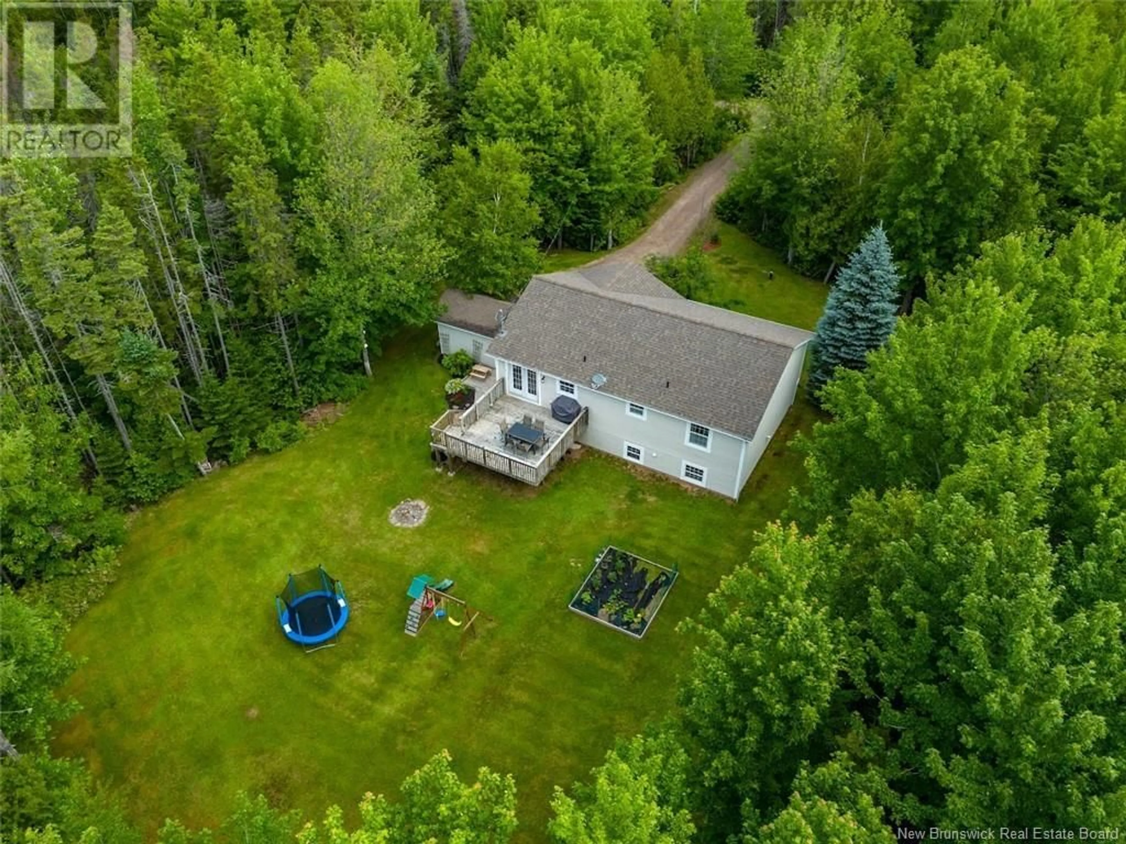 A pic from outside/outdoor area/front of a property/back of a property/a pic from drone, forest/trees view for 11 HERITAGE, Grand-Barachois New Brunswick E4P3X2