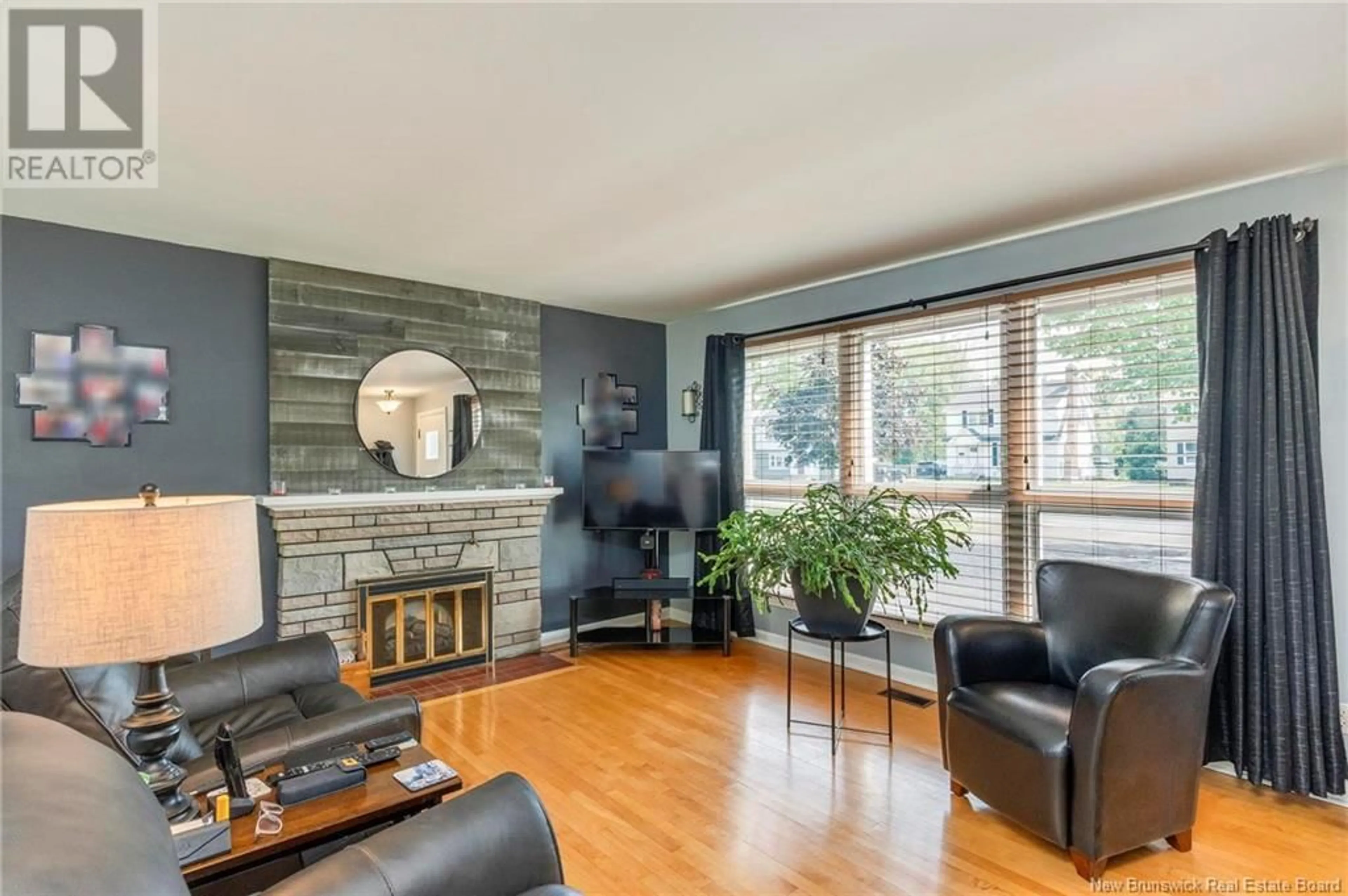 Living room with furniture, wood/laminate floor for 307 SHEDIAC ROAD, Moncton New Brunswick E1A2S6