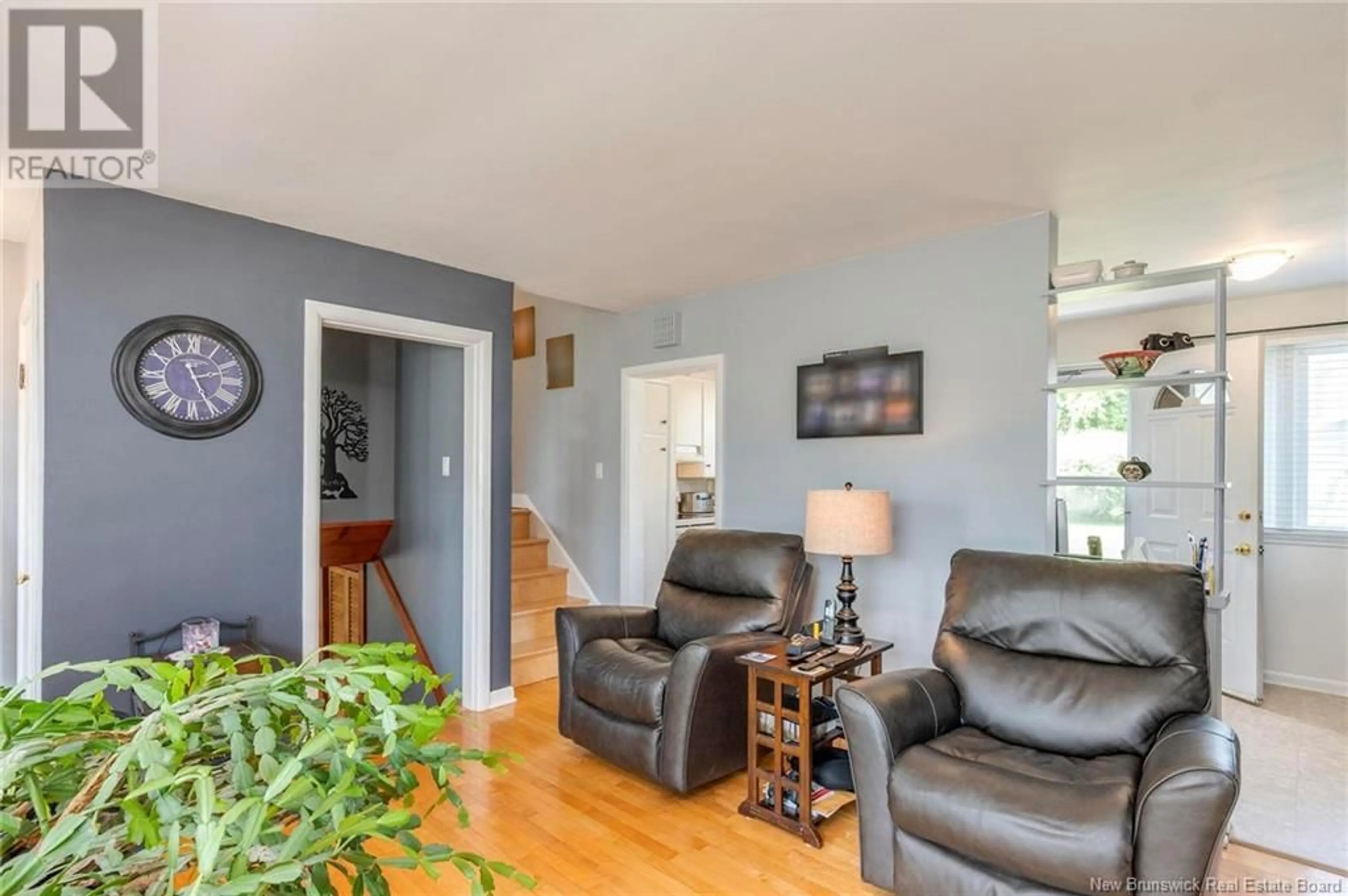 Living room with furniture, wood/laminate floor for 307 SHEDIAC ROAD, Moncton New Brunswick E1A2S6