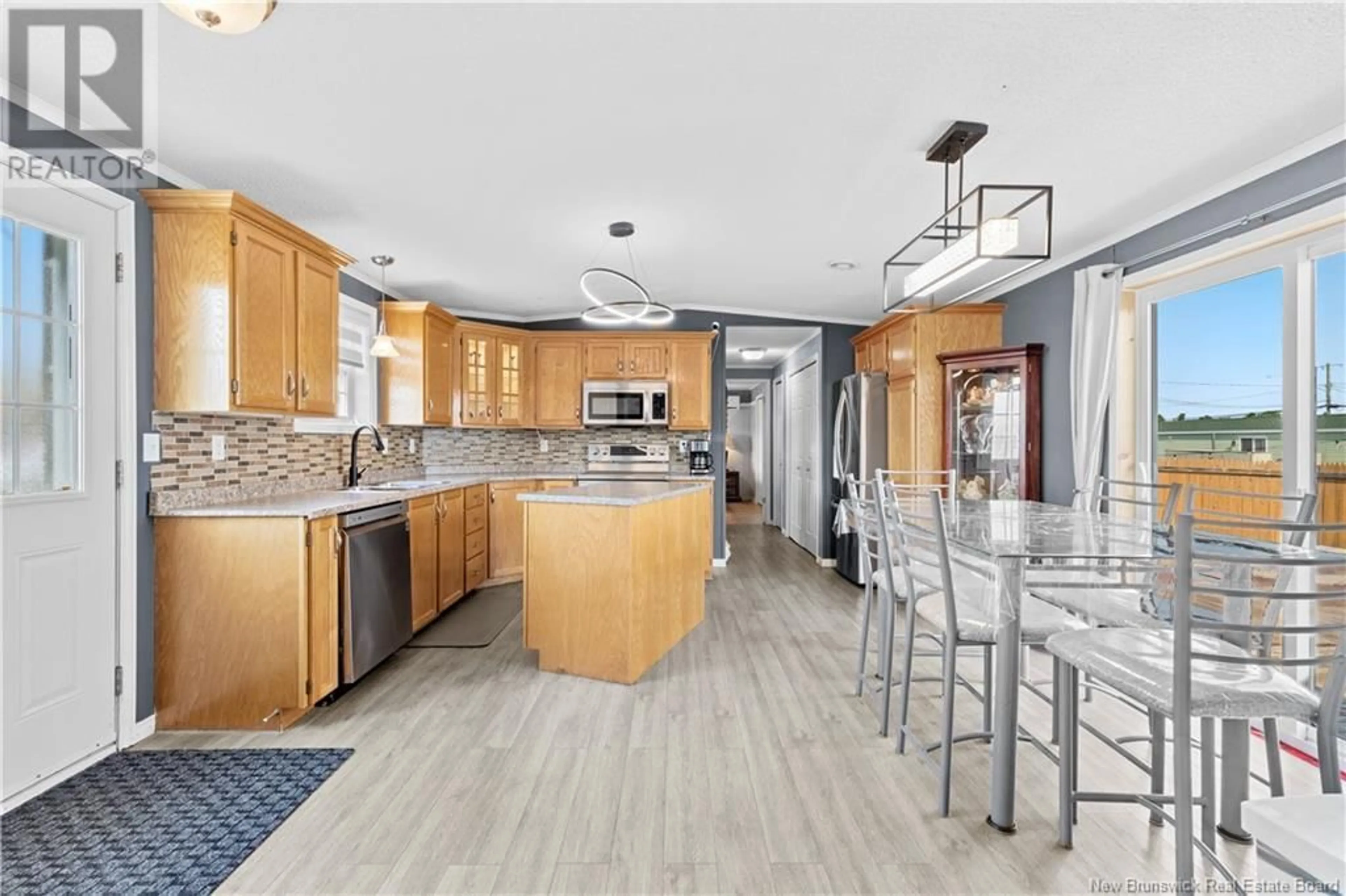 Open concept kitchen, ceramic/tile floor for 42 TRACADIE DRIVE, Dieppe New Brunswick E1A8P2