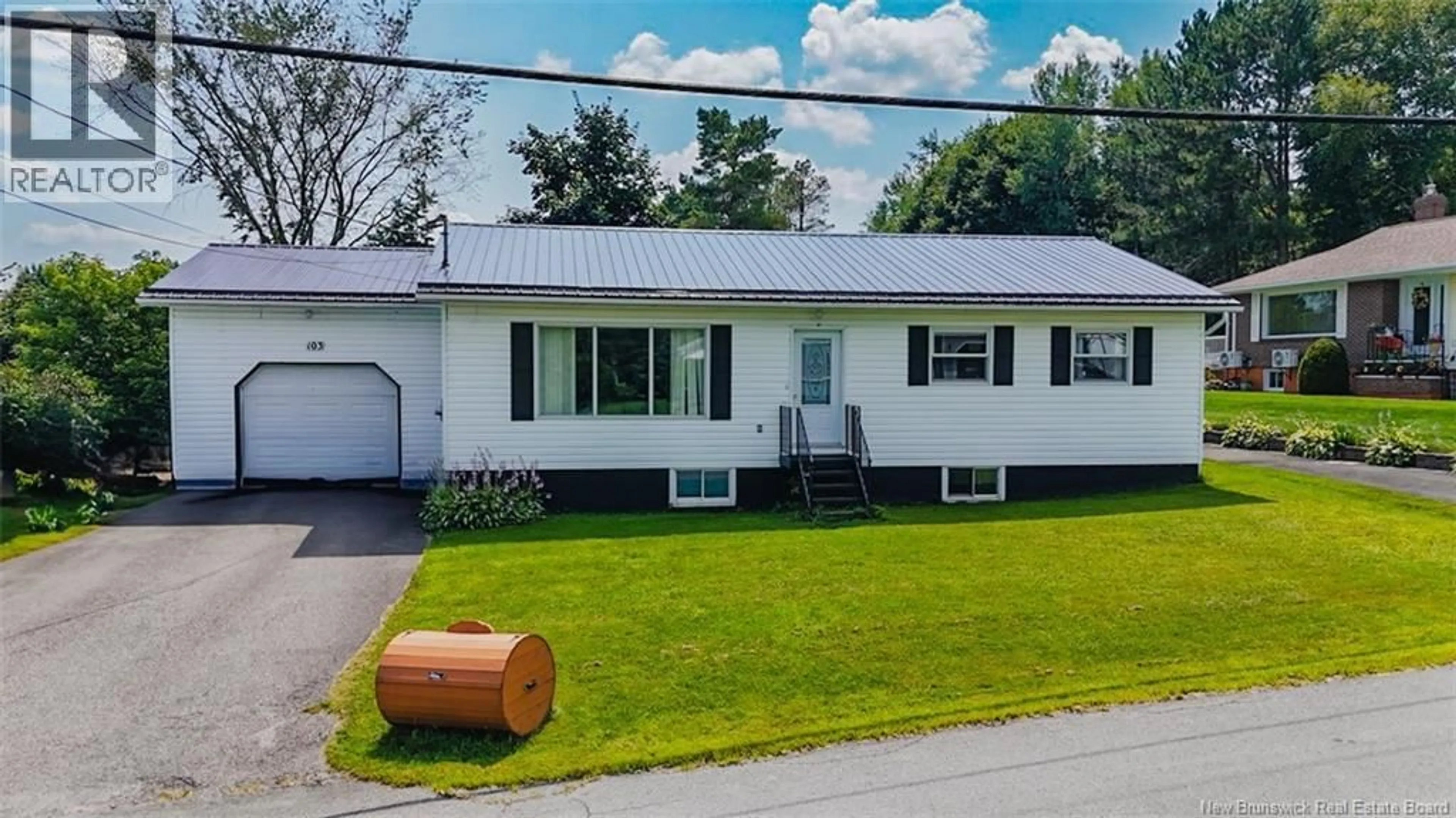 Home with vinyl exterior material, street for 103 STILES STREET, Woodstock New Brunswick E7M2T1
