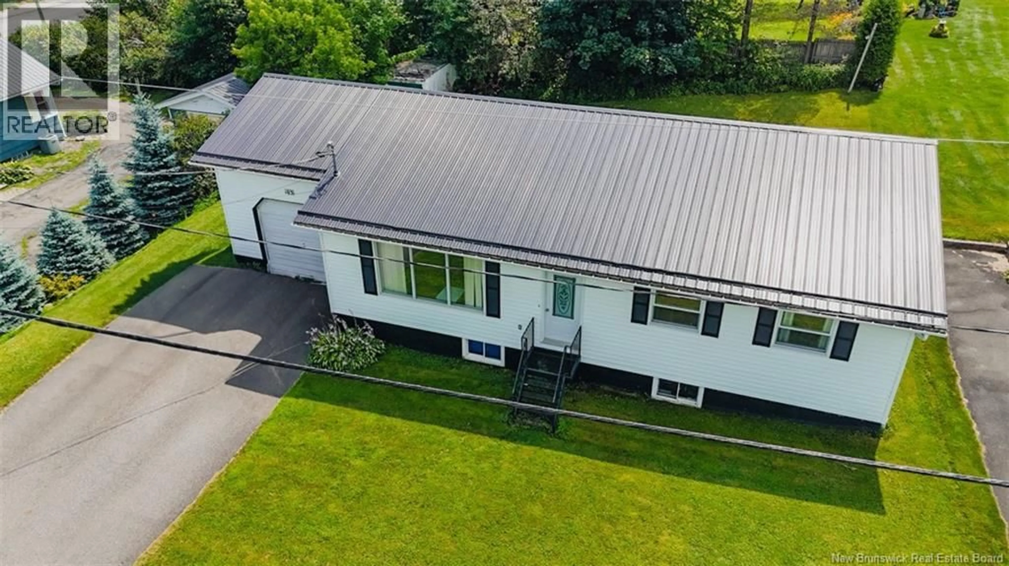 A pic from outside/outdoor area/front of a property/back of a property/a pic from drone, building for 103 STILES STREET, Woodstock New Brunswick E7M2T1
