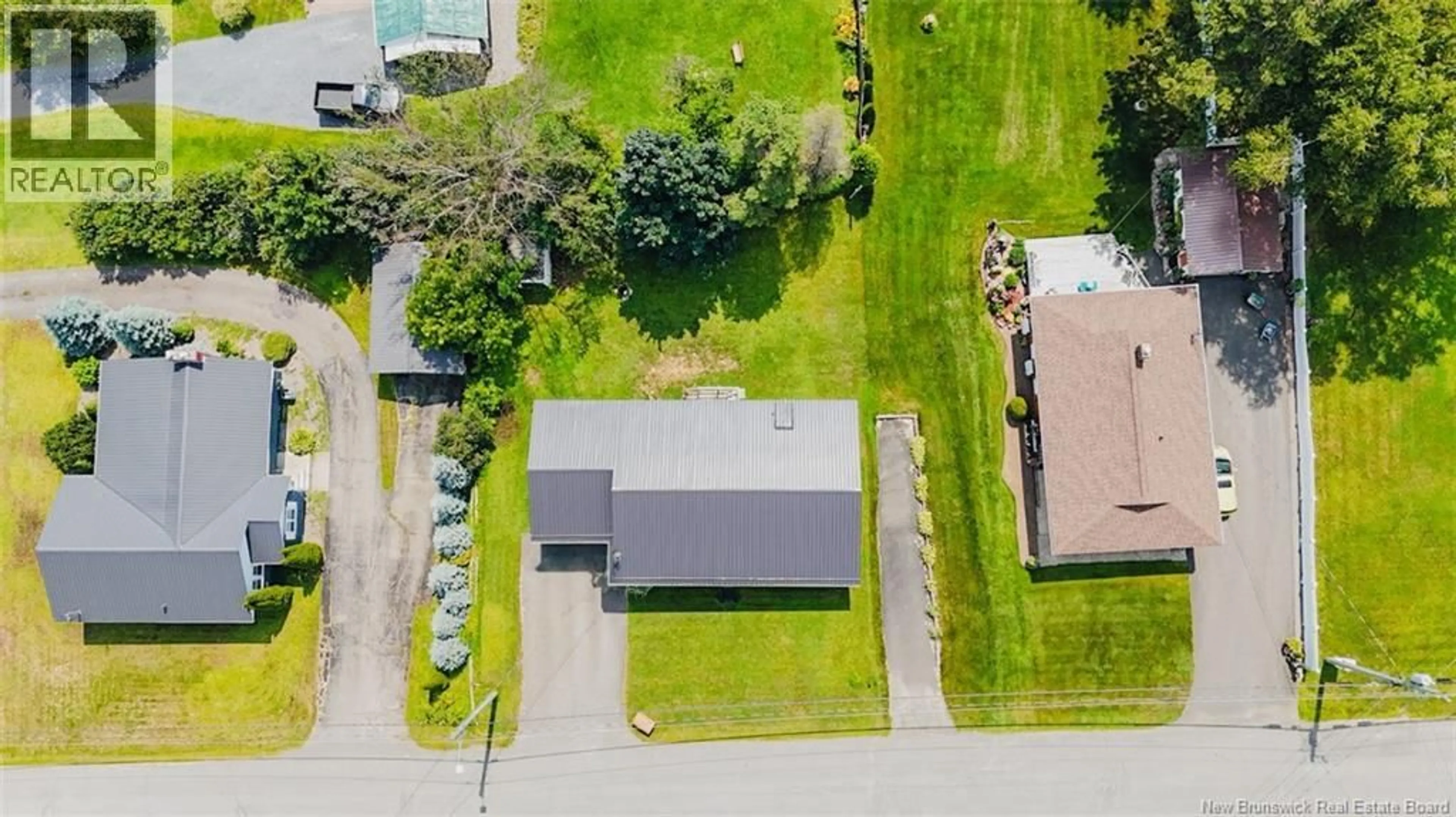 A pic from outside/outdoor area/front of a property/back of a property/a pic from drone, unknown for 103 STILES STREET, Woodstock New Brunswick E7M2T1