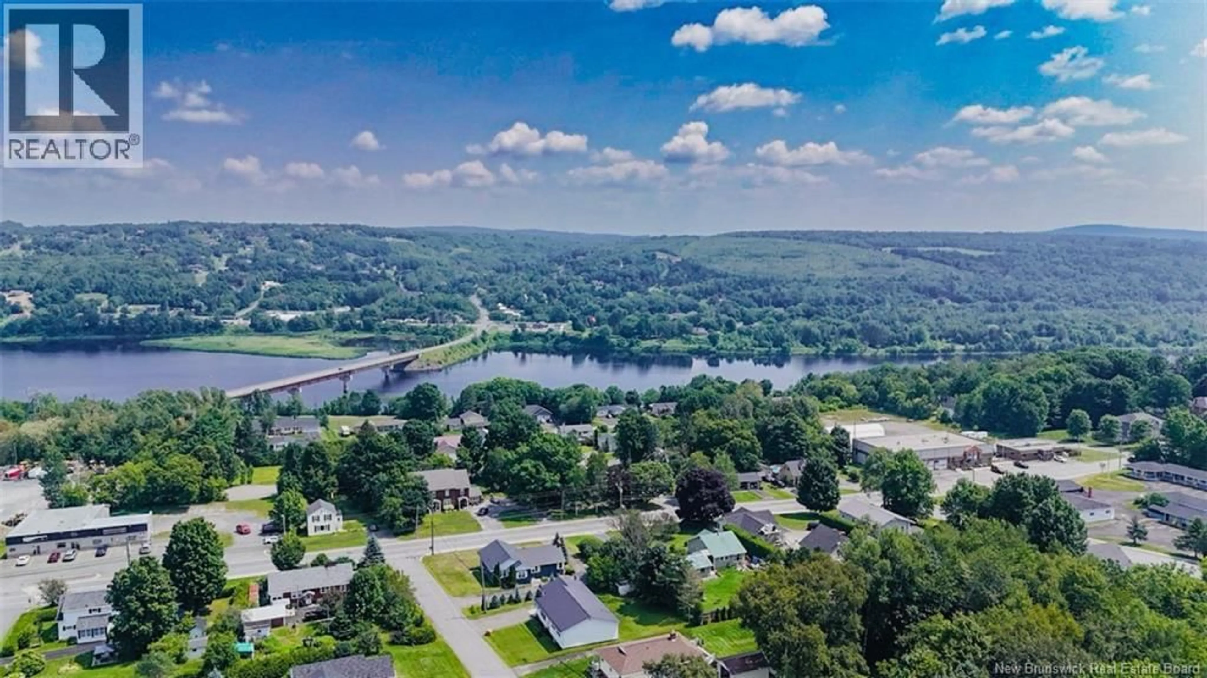A pic from outside/outdoor area/front of a property/back of a property/a pic from drone, water/lake/river/ocean view for 103 STILES STREET, Woodstock New Brunswick E7M2T1