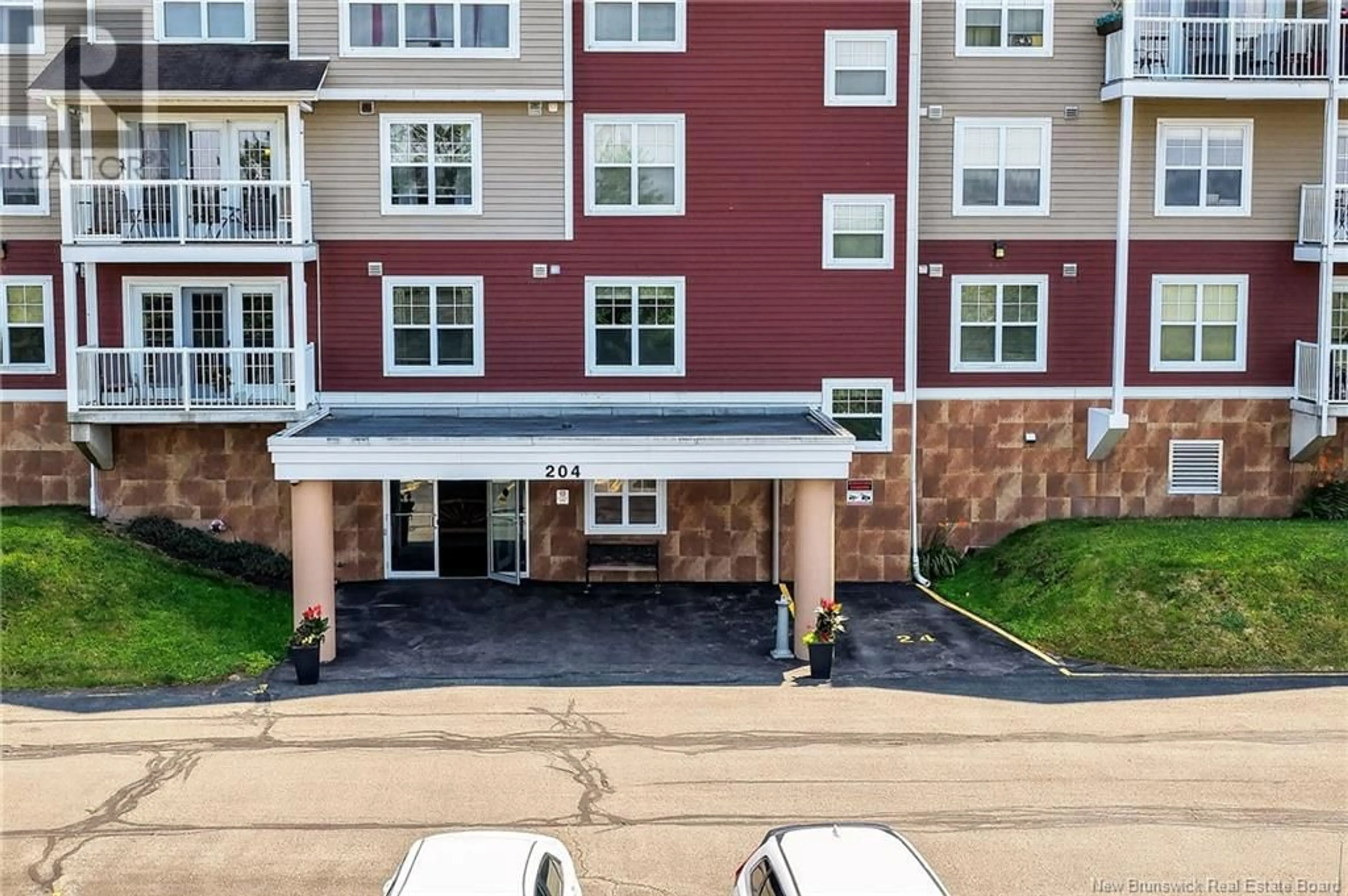 A pic from outside/outdoor area/front of a property/back of a property/a pic from drone, street for 301 - 204 COVERDALE ROAD, Riverview New Brunswick E1B0J2